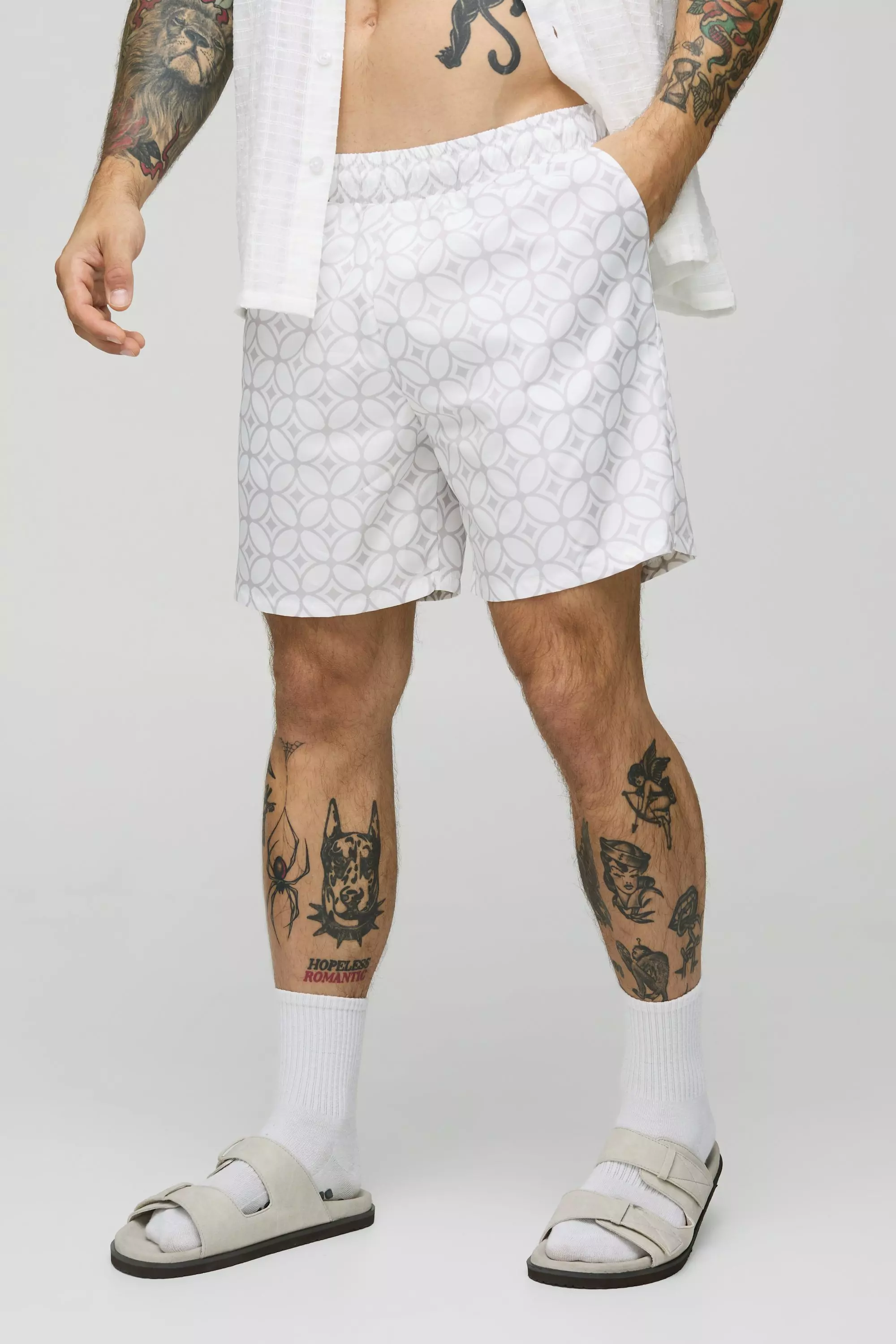 Abstract Pattern Mid Length Swim Trunks | boohooMAN USA