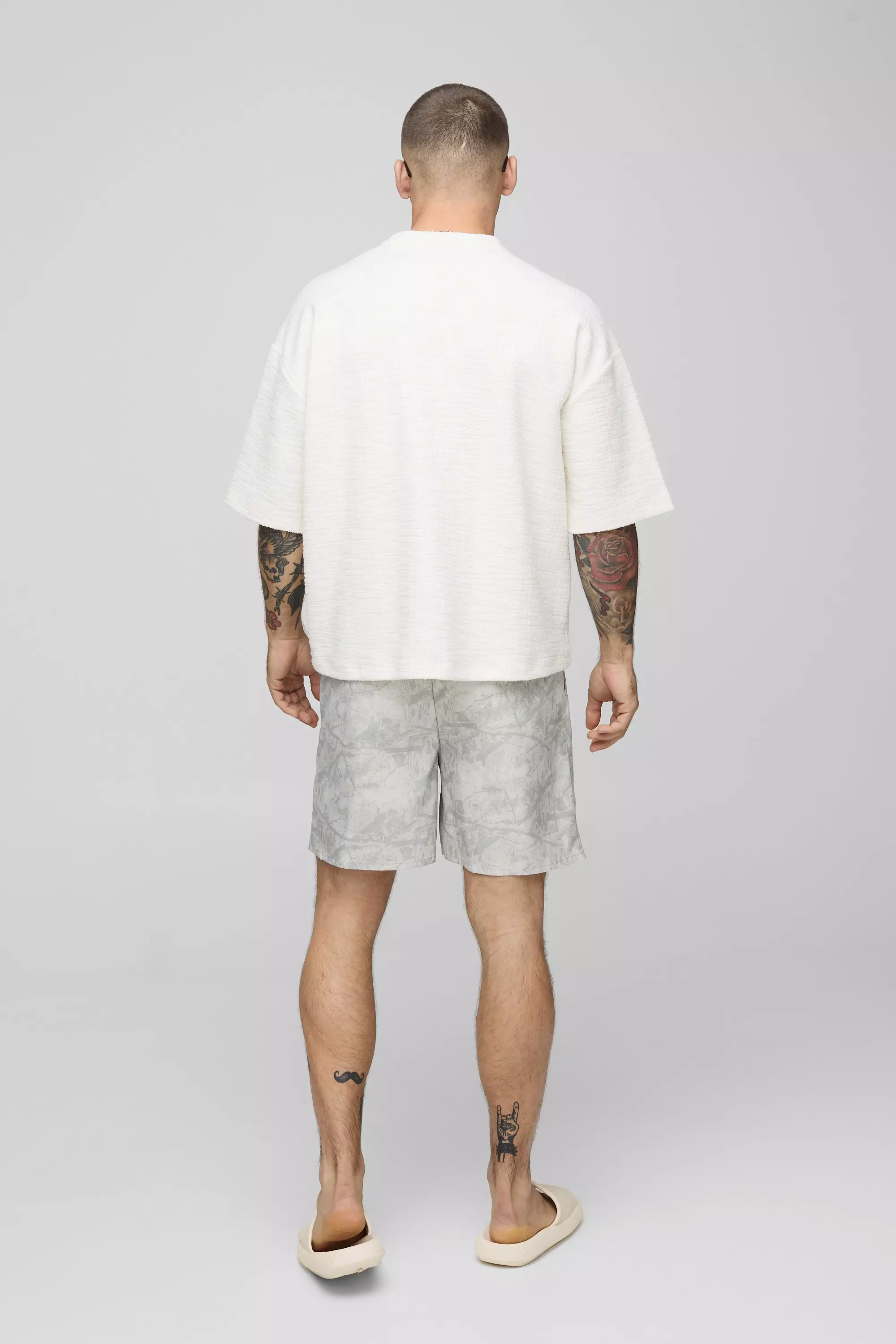 Camo Leaf Mid Length Swim Trunks | boohooMAN USA