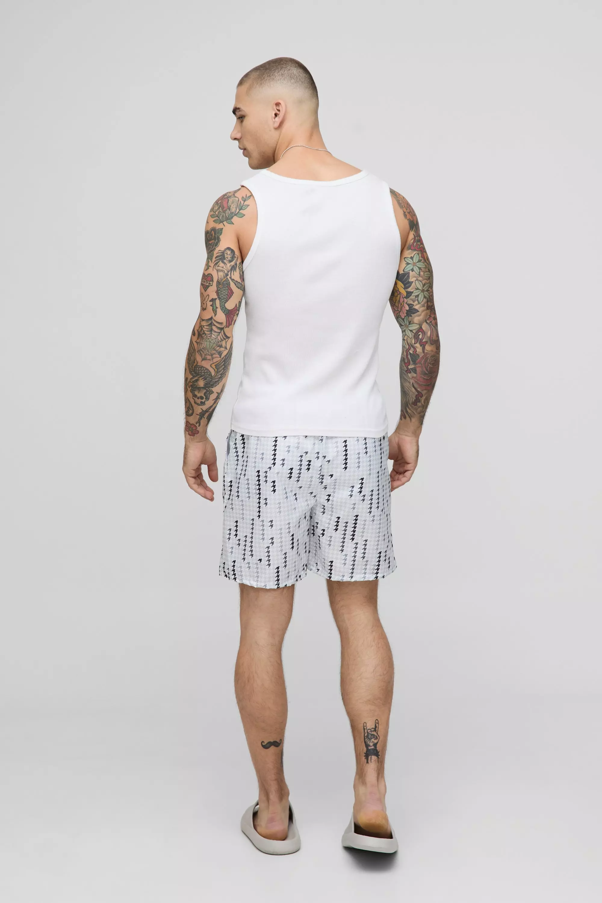 Houndstooth Printed Mid Length Swim Trunks | boohooMAN USA