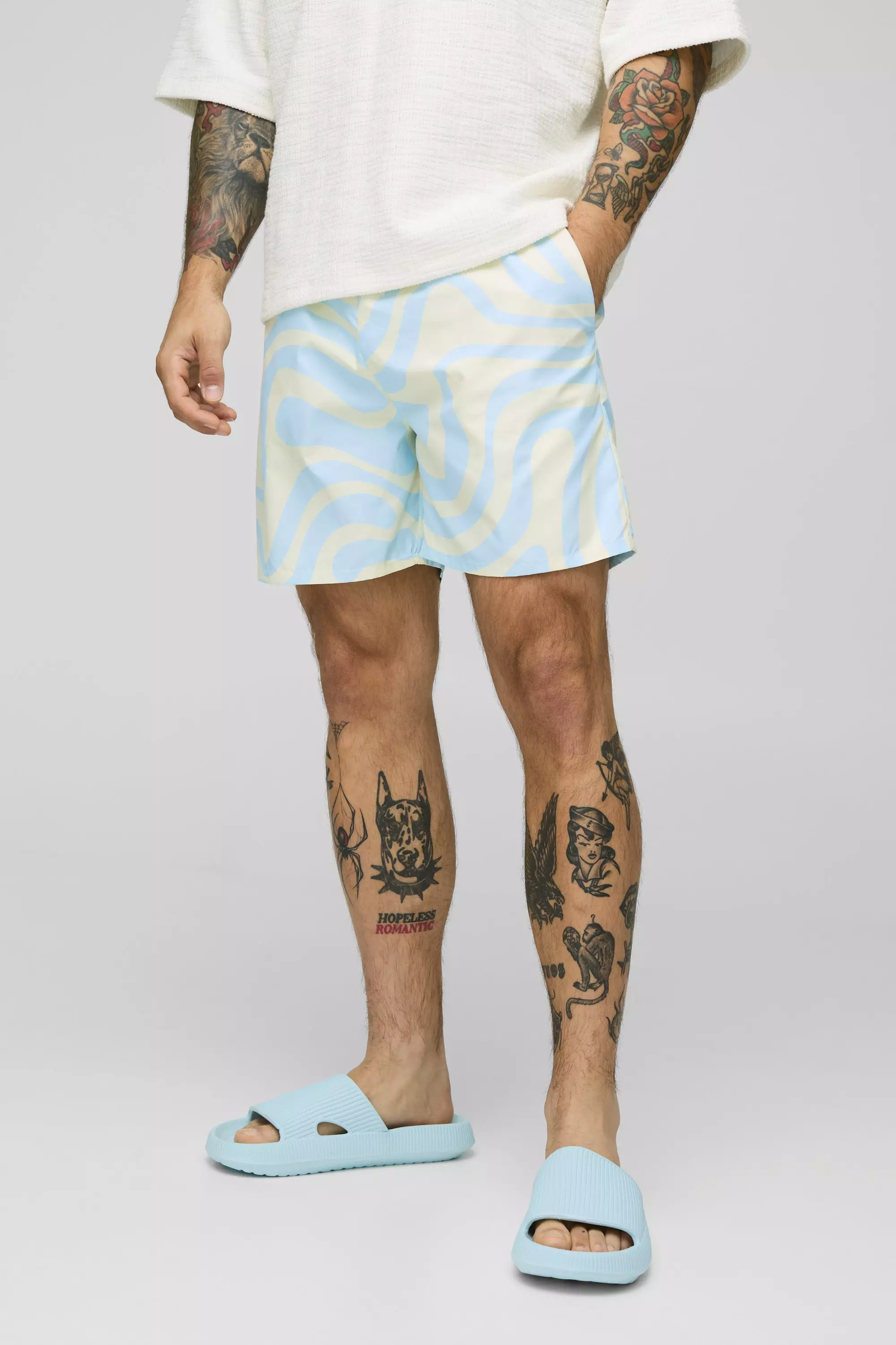 Mid Length Abstract Print Swim Trunks | boohooMAN USA