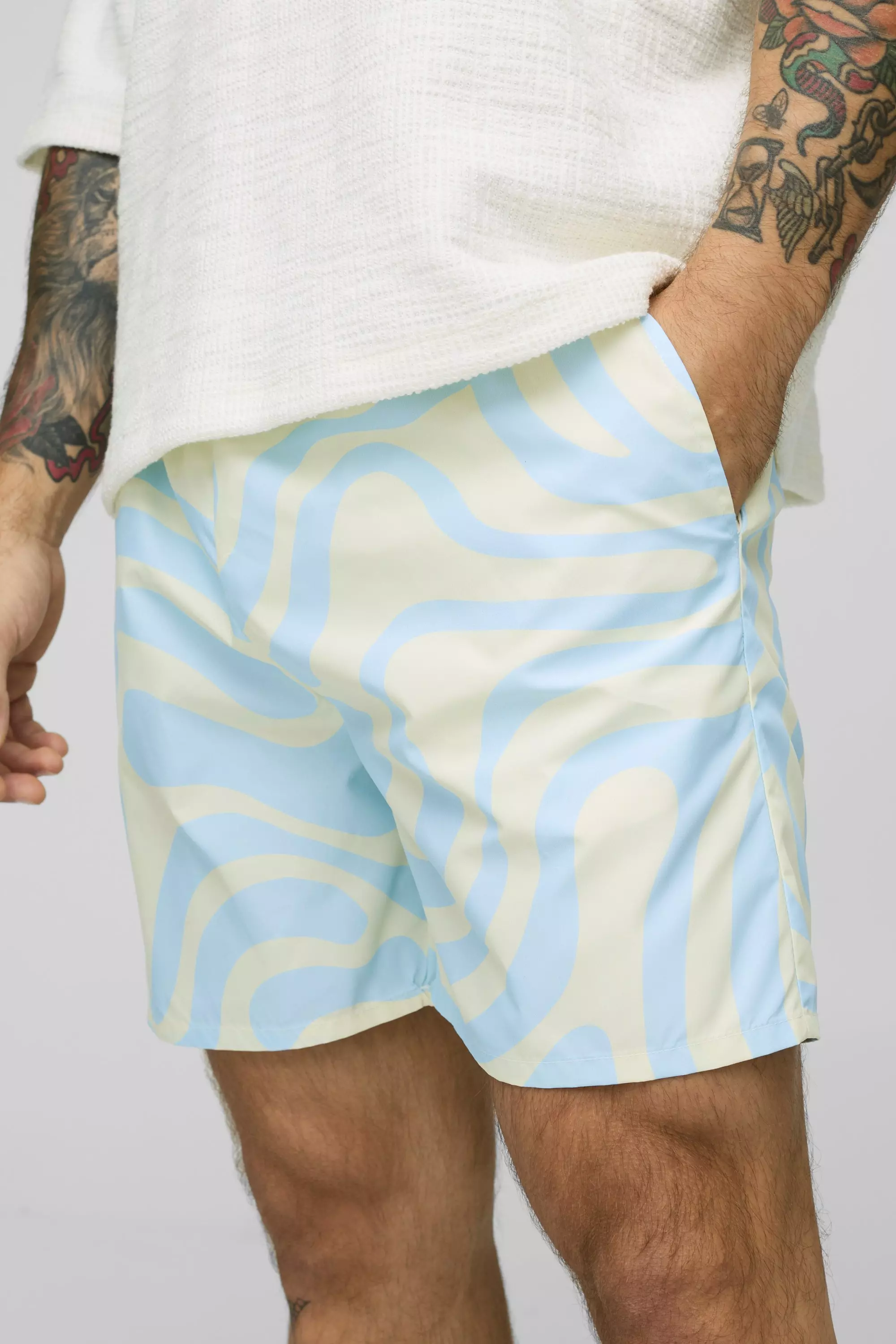 Mid Length Abstract Print Swim Trunks | boohooMAN USA