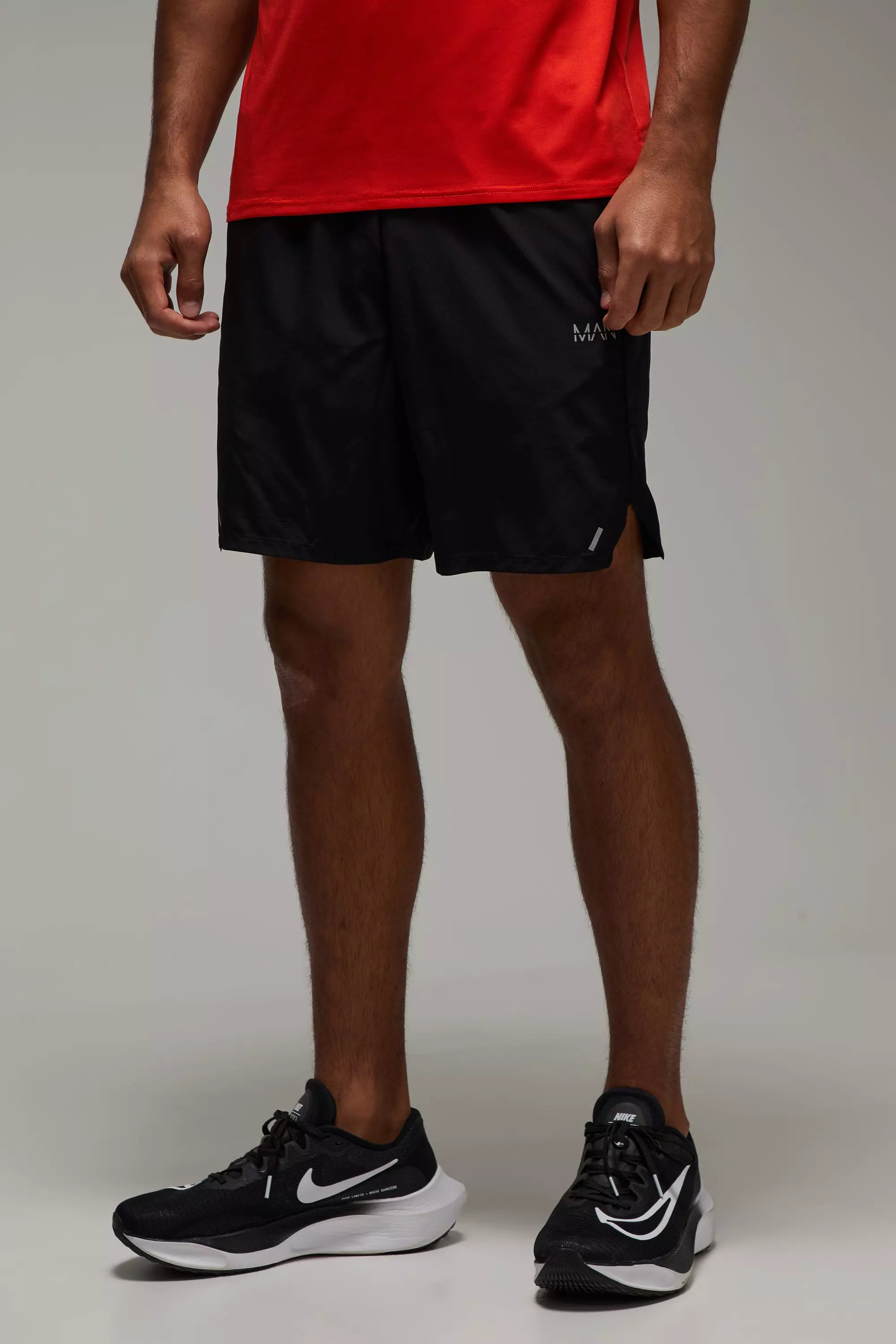 Man Active Perforated Stretch Woven 7inch Shorts Black