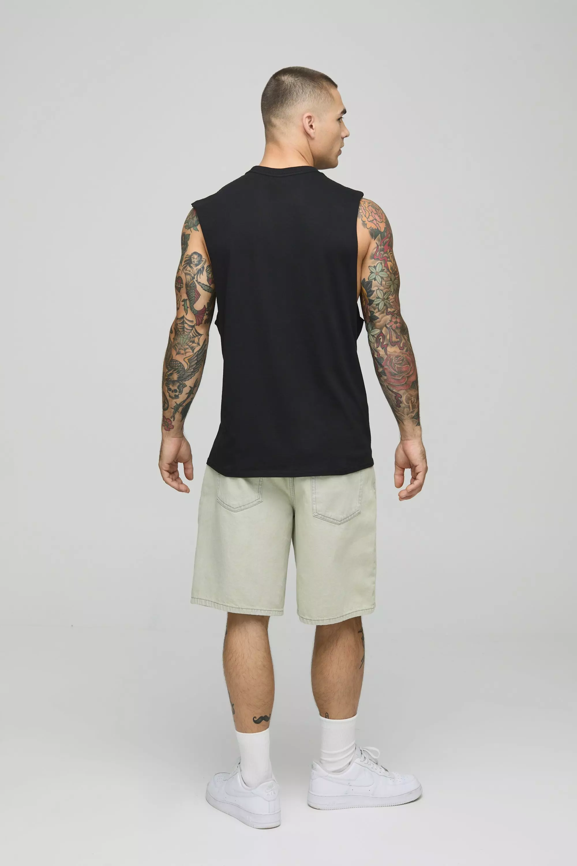 Oversized Guns N Roses Drop Armhole License Tank | boohooMAN USA