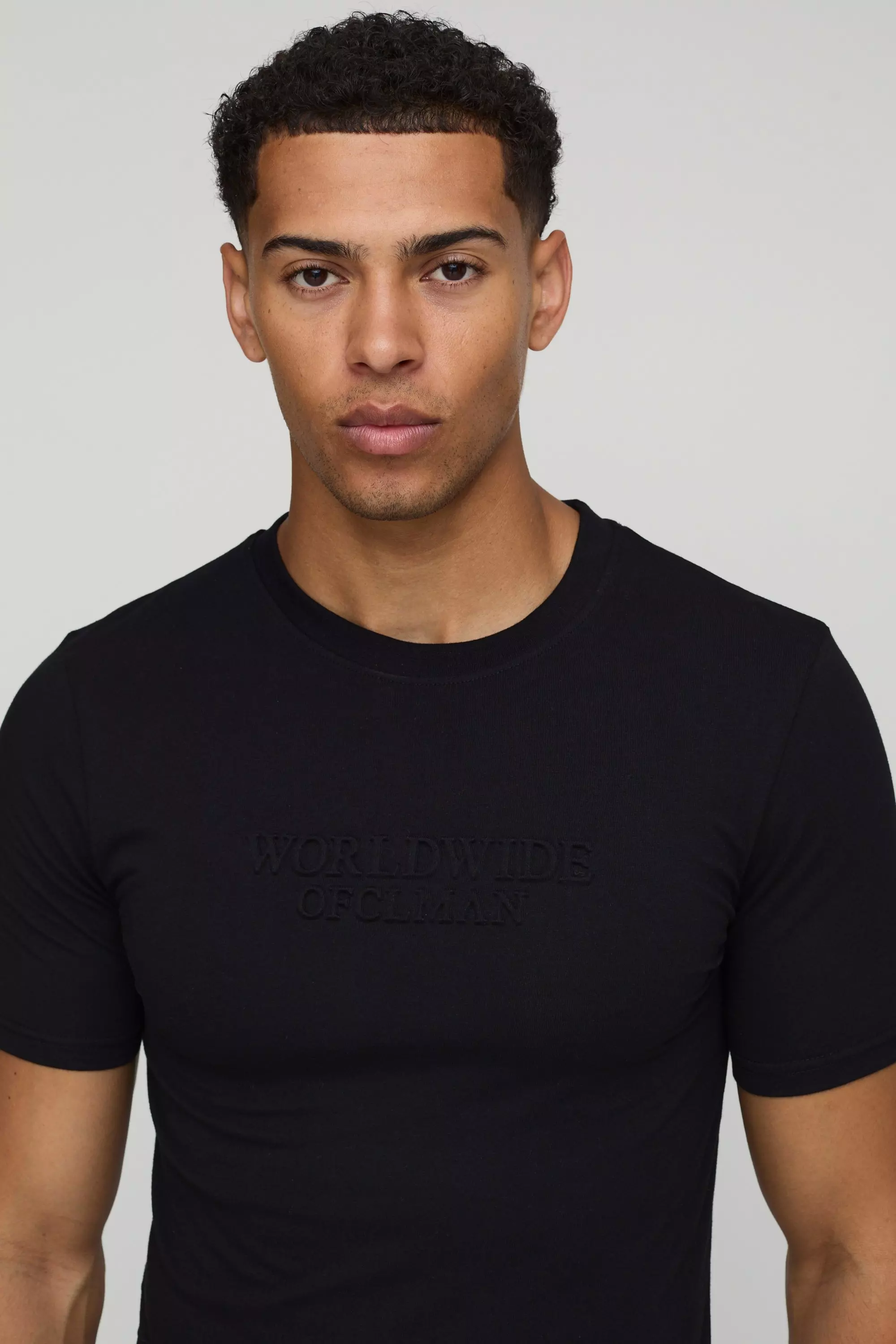 Muscle Fit Peached Worldwide Embossed T-Shirt | boohooMAN USA