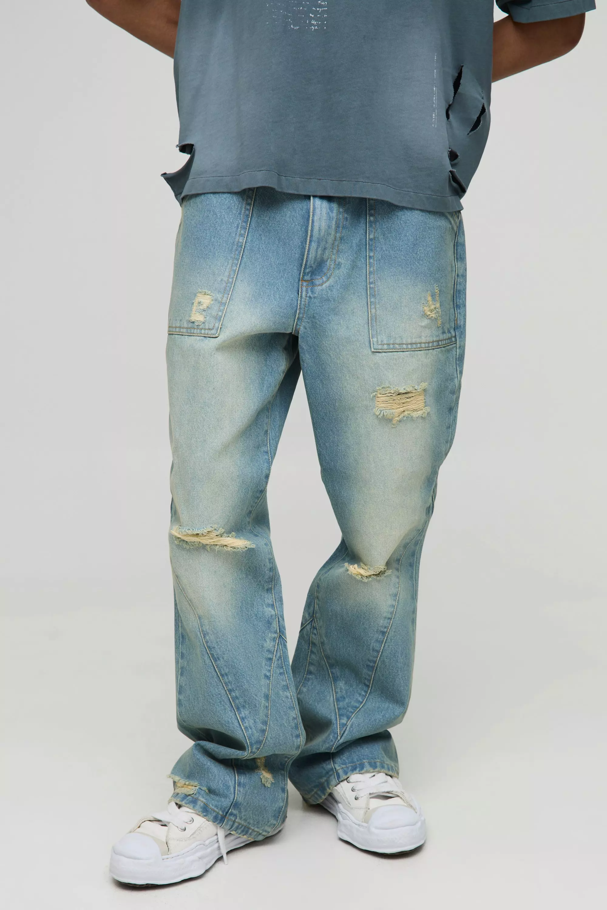 Relaxed Rigid Flared Blue Washed Ripped Paneled Jeans | boohooMAN USA