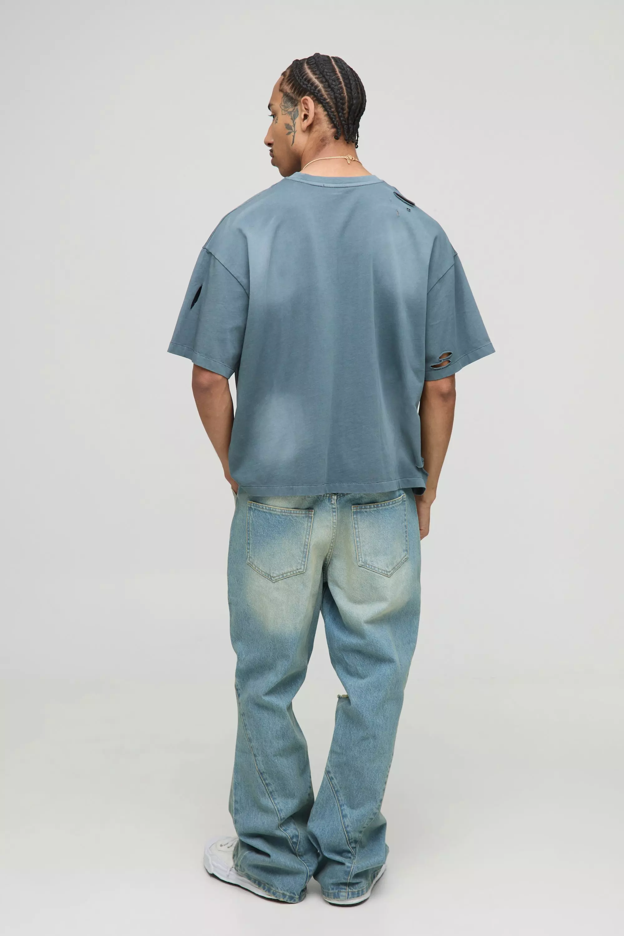 Relaxed Rigid Flared Blue Washed Ripped Paneled Jeans | boohooMAN USA