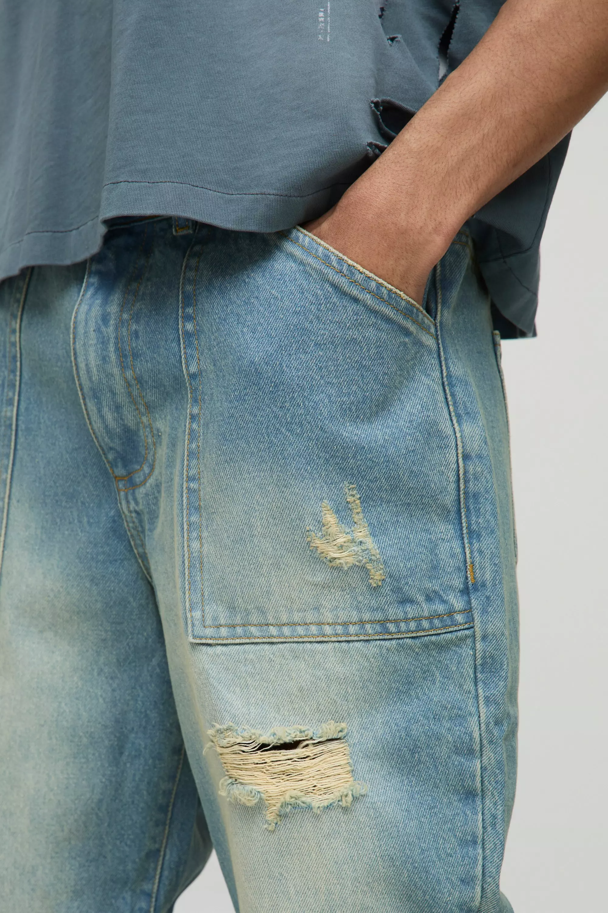 Relaxed Rigid Flared Blue Washed Ripped Paneled Jeans | boohooMAN USA