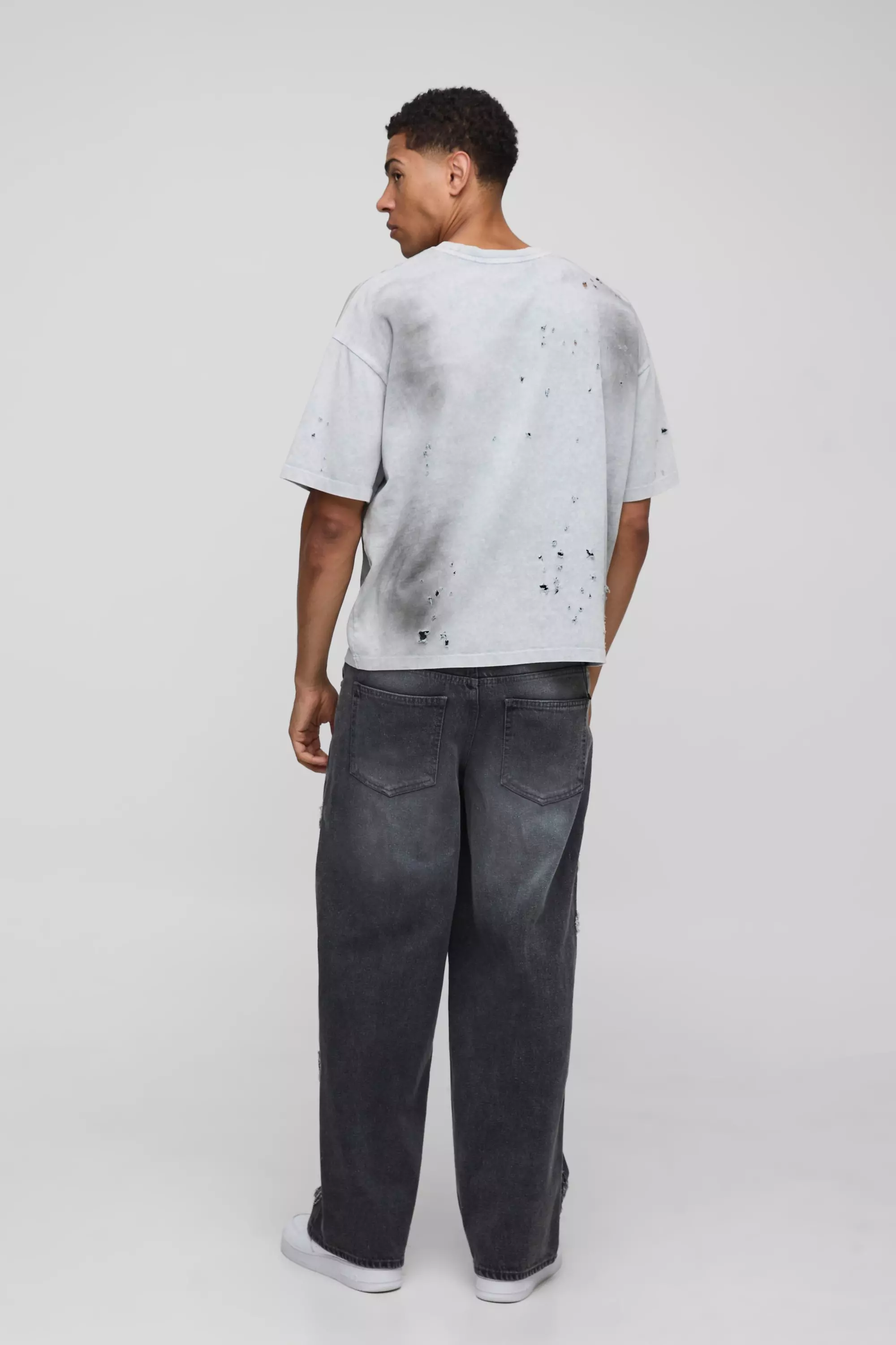 Baggy Fit Tribal Distressed Applique Washed Jeans | boohooMAN USA