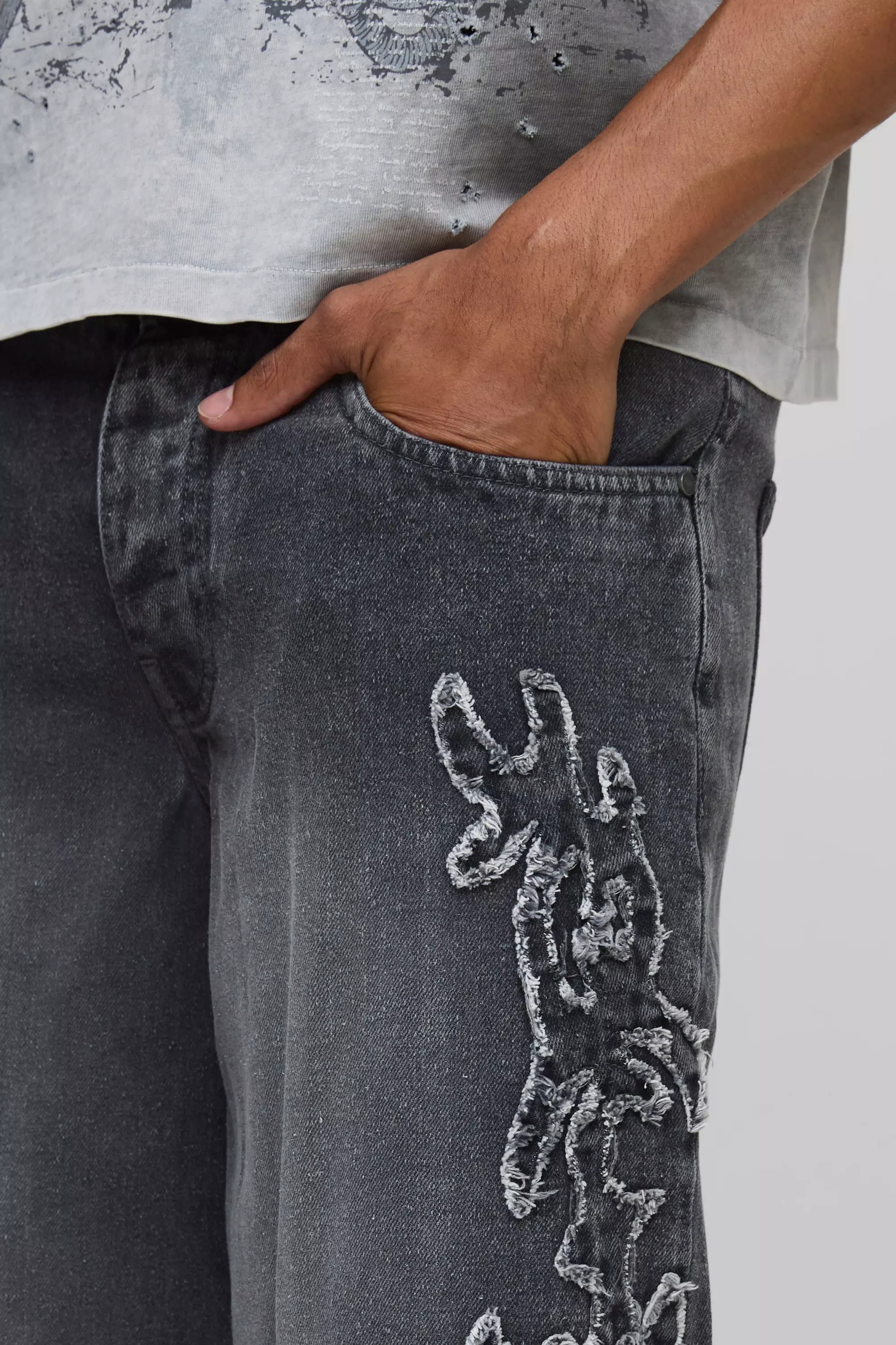 Baggy Fit Tribal Distressed Applique Washed Jeans | boohooMAN USA