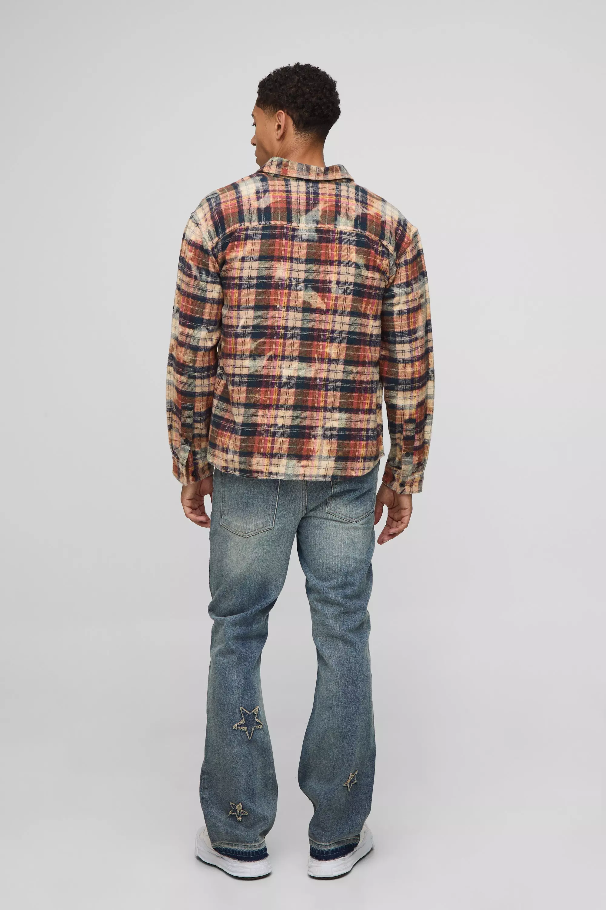 Slim Flared Star Applique Let Down Hem Jeans | boohooMAN USA