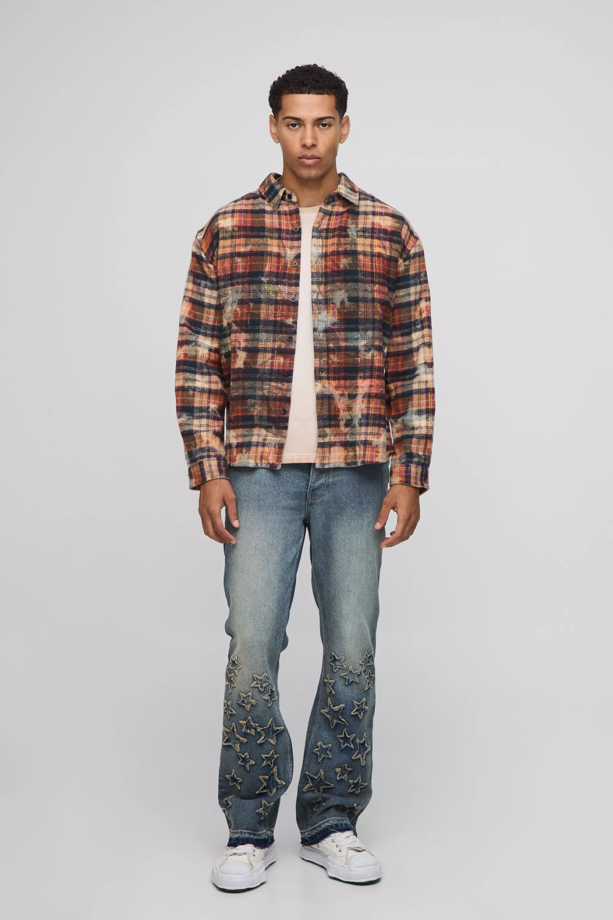 Slim Flared Star Applique Let Down Hem Jeans | boohooMAN USA