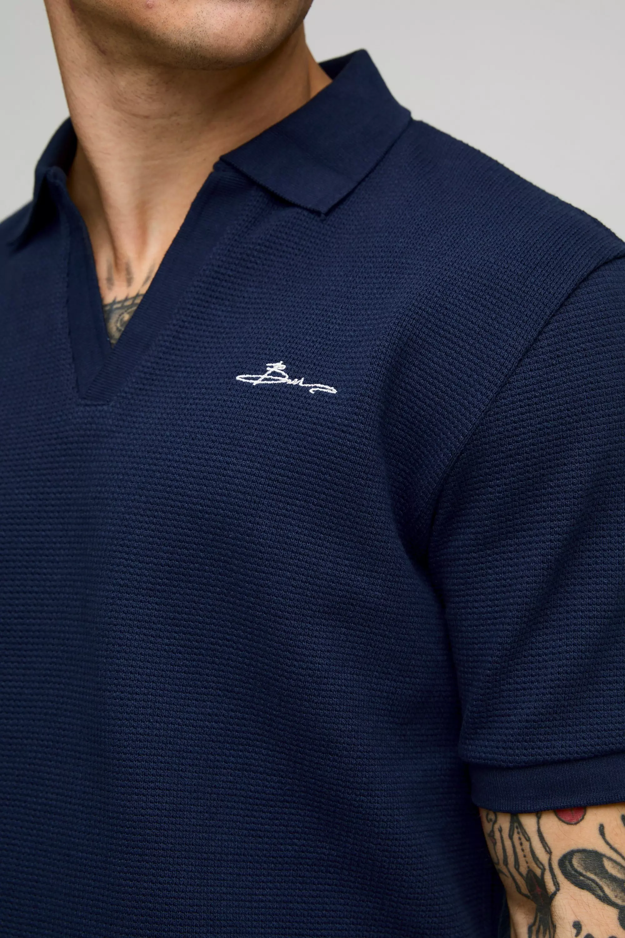 Slim Fit BM Signature Embroidered V Neck Textured Polo | boohooMAN USA
