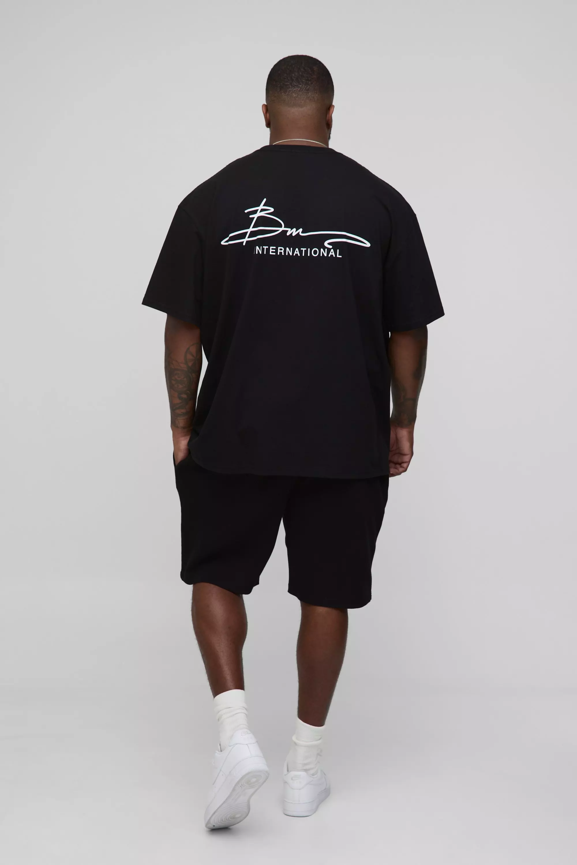 Plus Oversize T-Shirt mit BM International Print, Black alternatives Bild