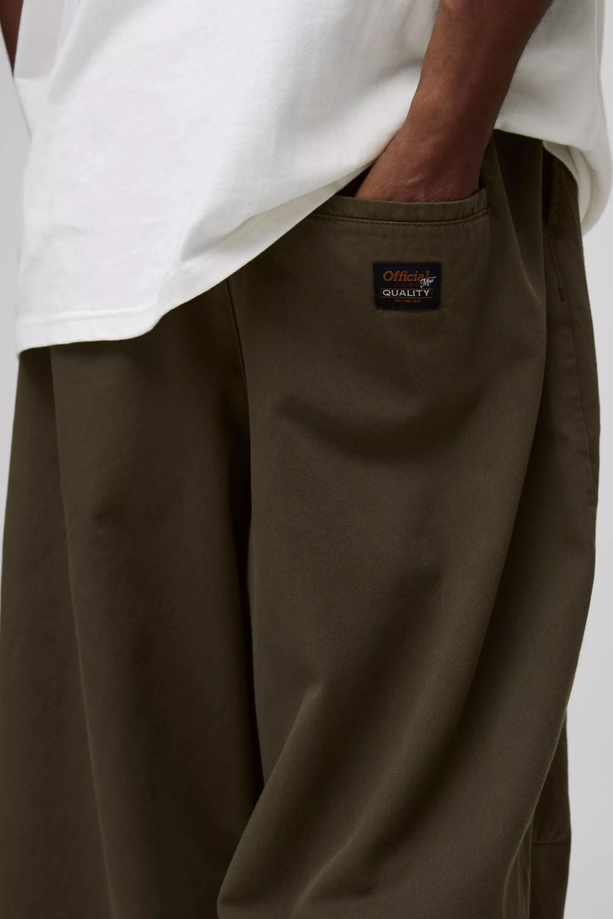 Tall Balloon Fit Pleat Front Washed Twill Trousers | boohooMAN USA