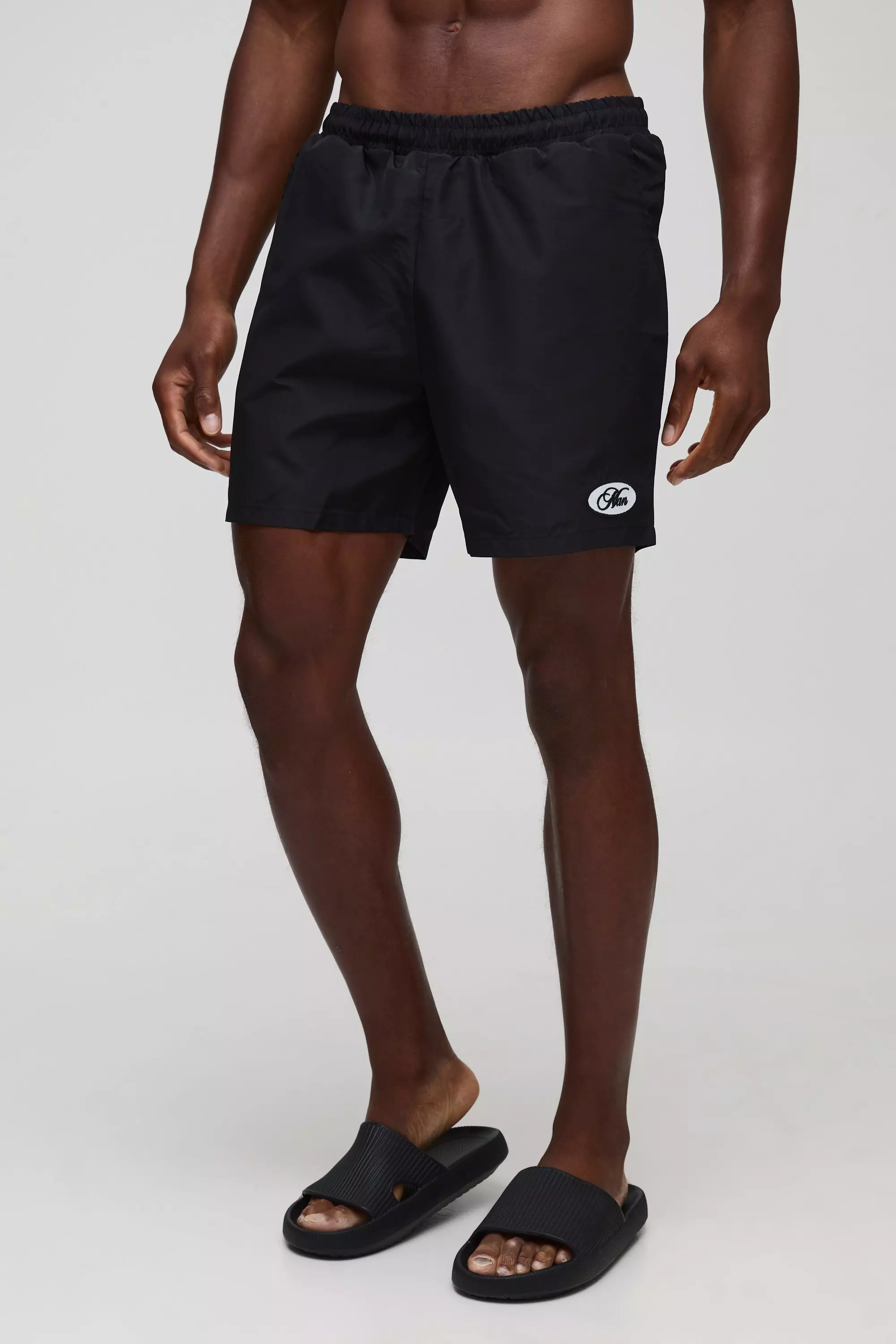 Mid Length Embroidered Stripe Swim Short Black
