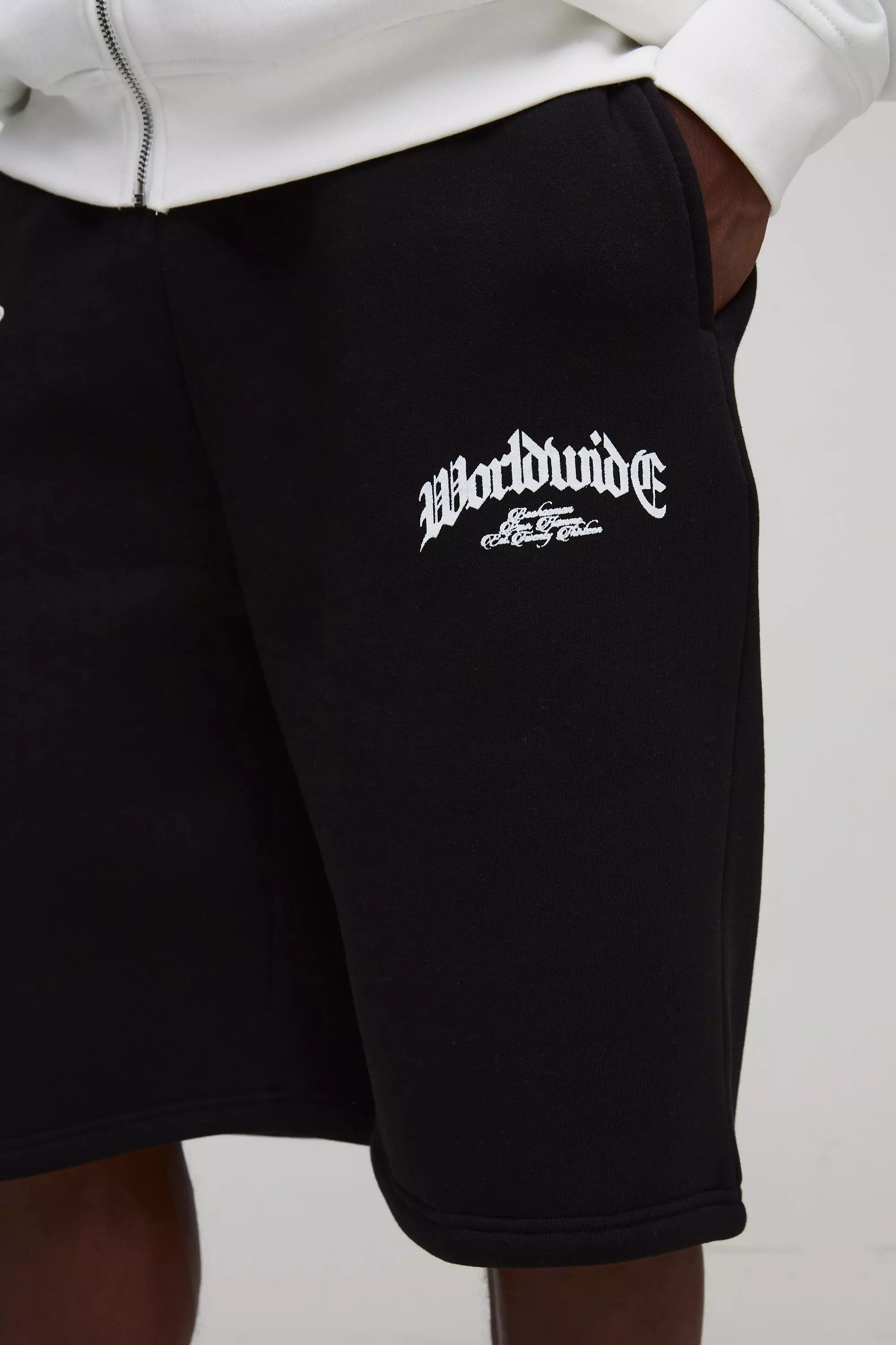 Oversized Worldwide Cross Long Length Shorts | boohooMAN USA