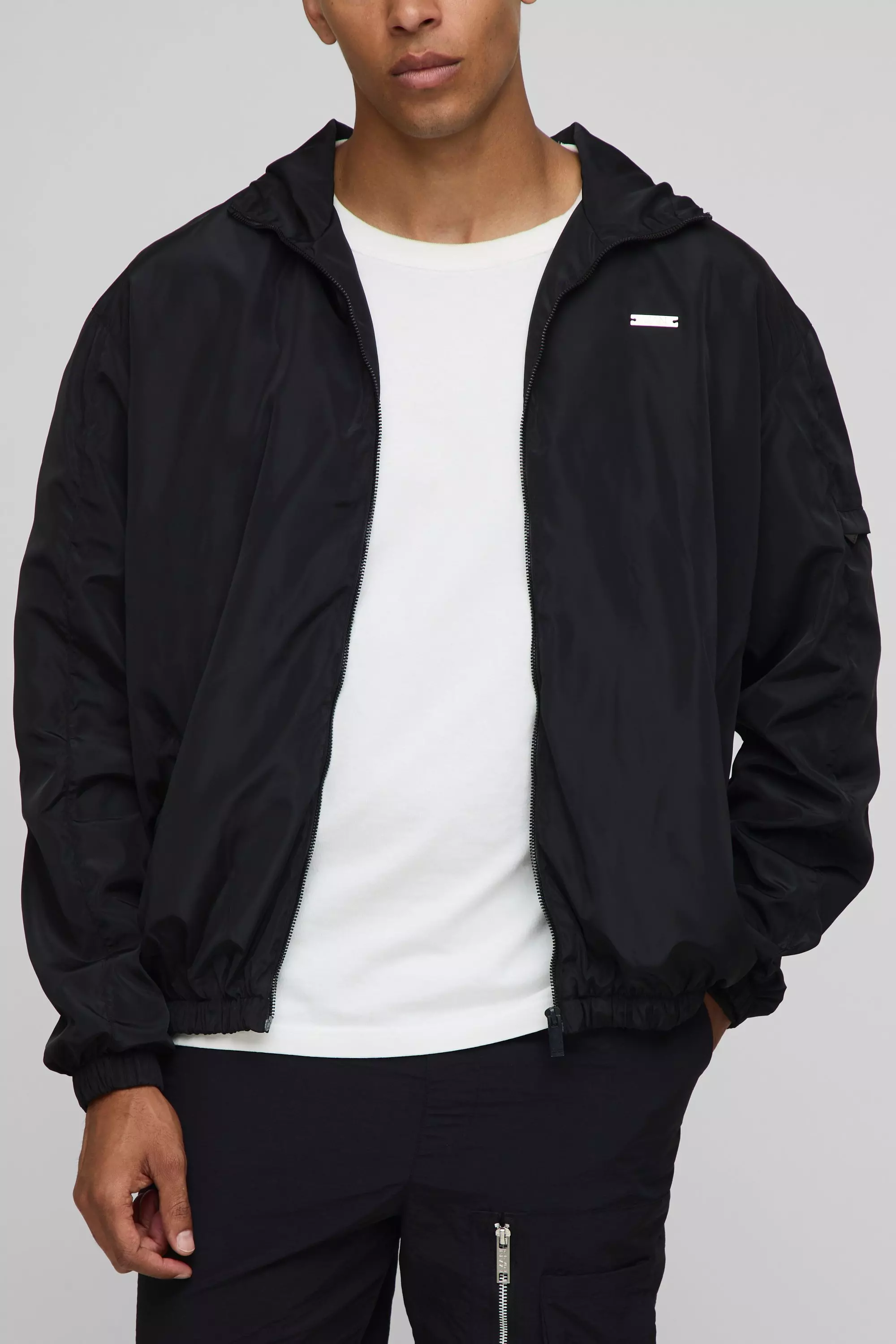 Regular Fit Lightweight Nylon Hooded Windbreaker Jacket | boohooMAN USA