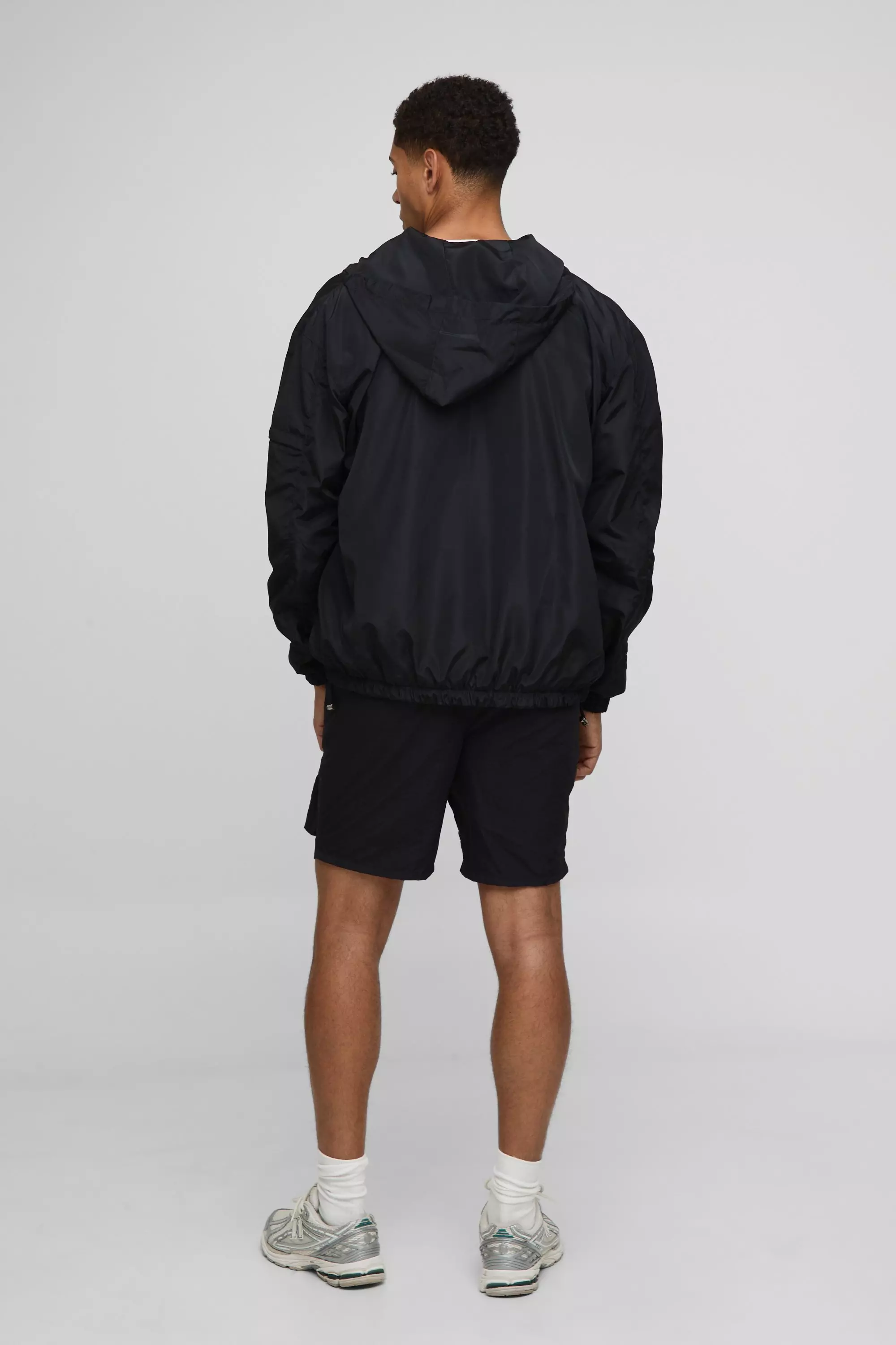 Regular Fit Lightweight Nylon Hooded Windbreaker Jacket | boohooMAN USA