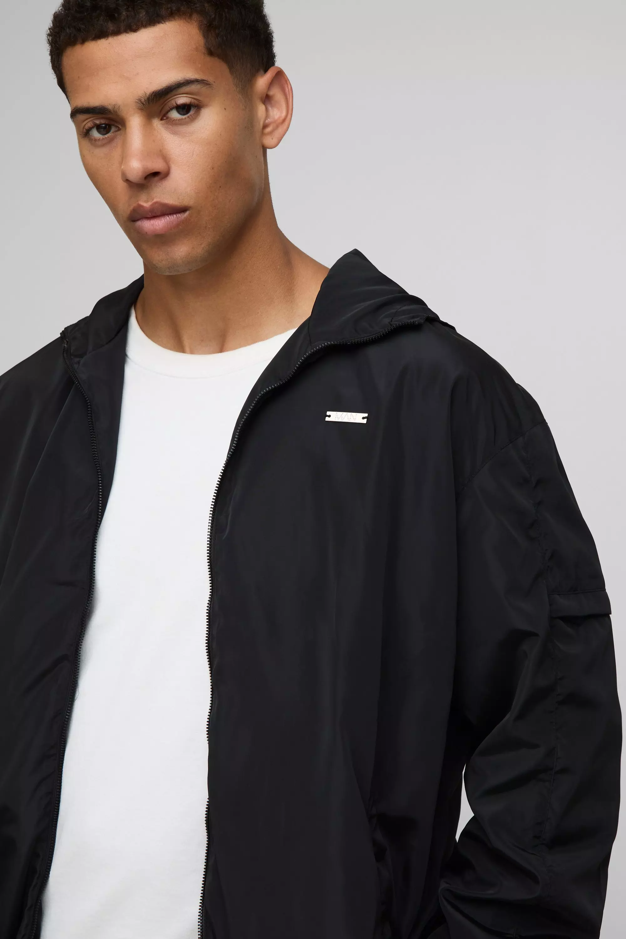 Regular Fit Lightweight Nylon Hooded Windbreaker Jacket | boohooMAN USA