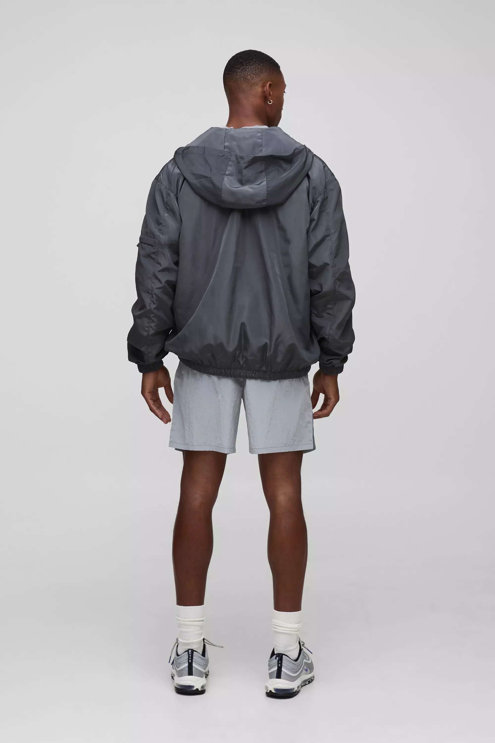 Regular Fit Lightweight Nylon Hooded Windbreaker Jacket | boohooMAN USA