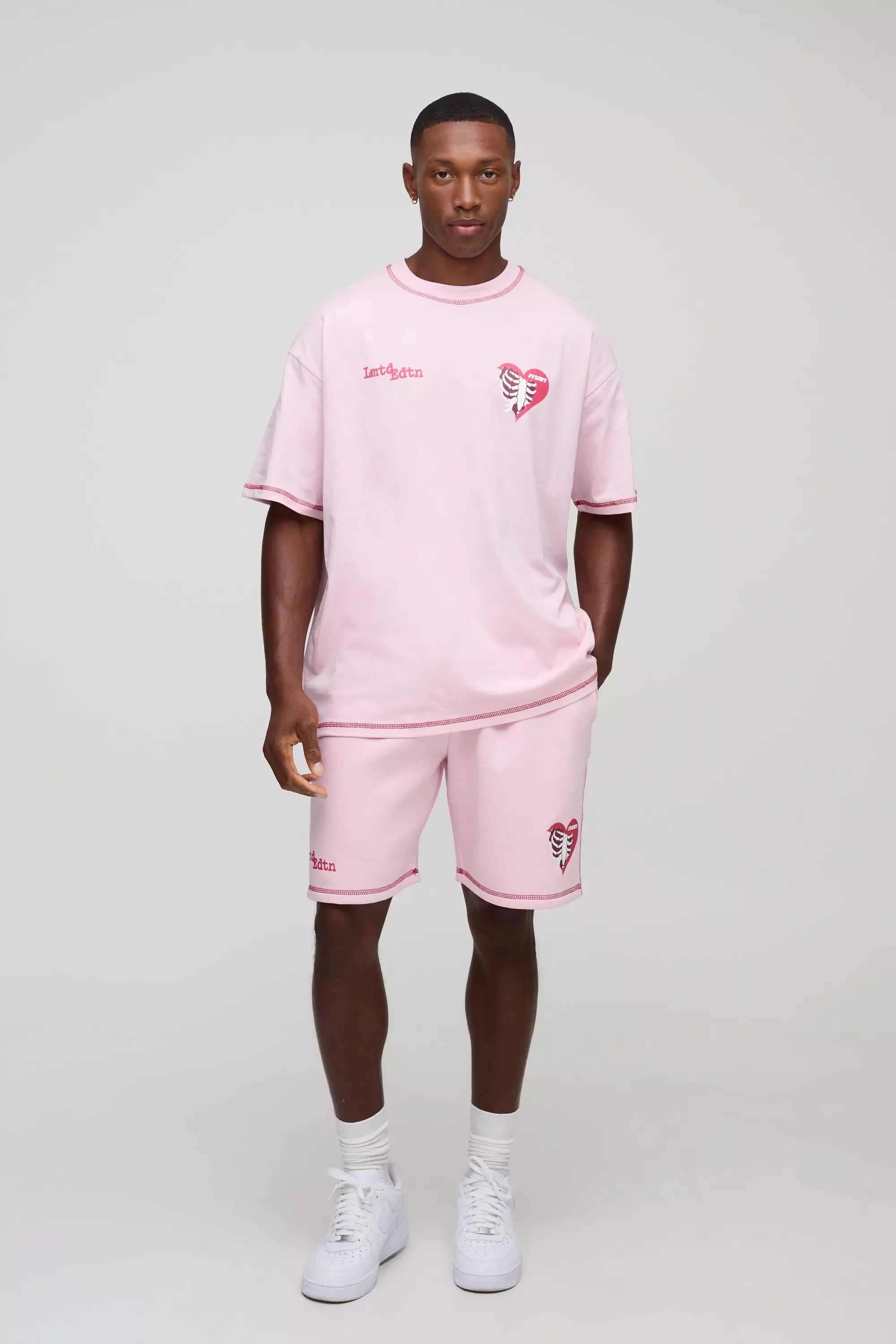 Pink Oversized Graphic T-Shirt And Relaxed Mid Short Set | boohooMAN UK