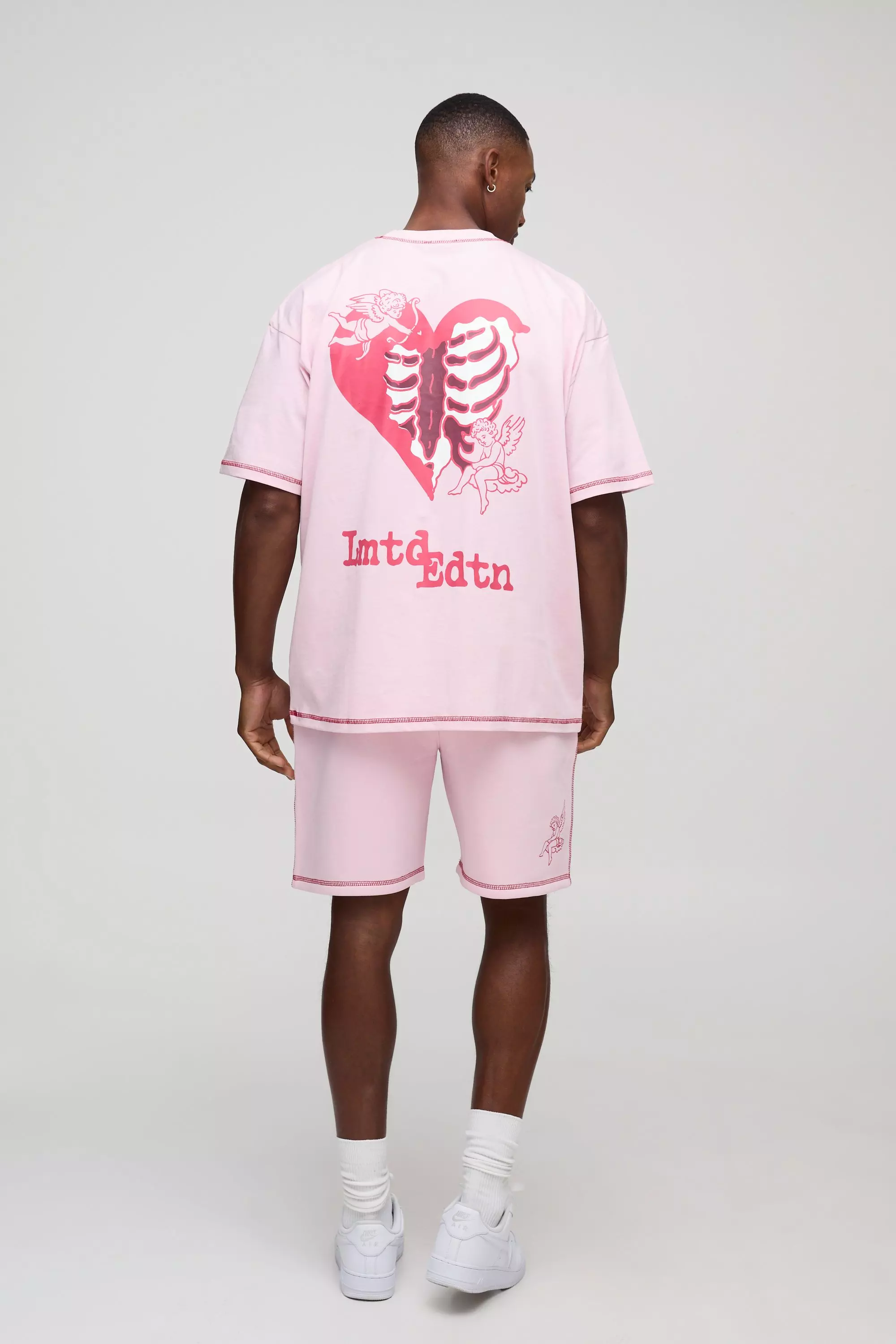 Pink Oversized Graphic T-Shirt And Relaxed Mid Short Set | boohooMAN UK