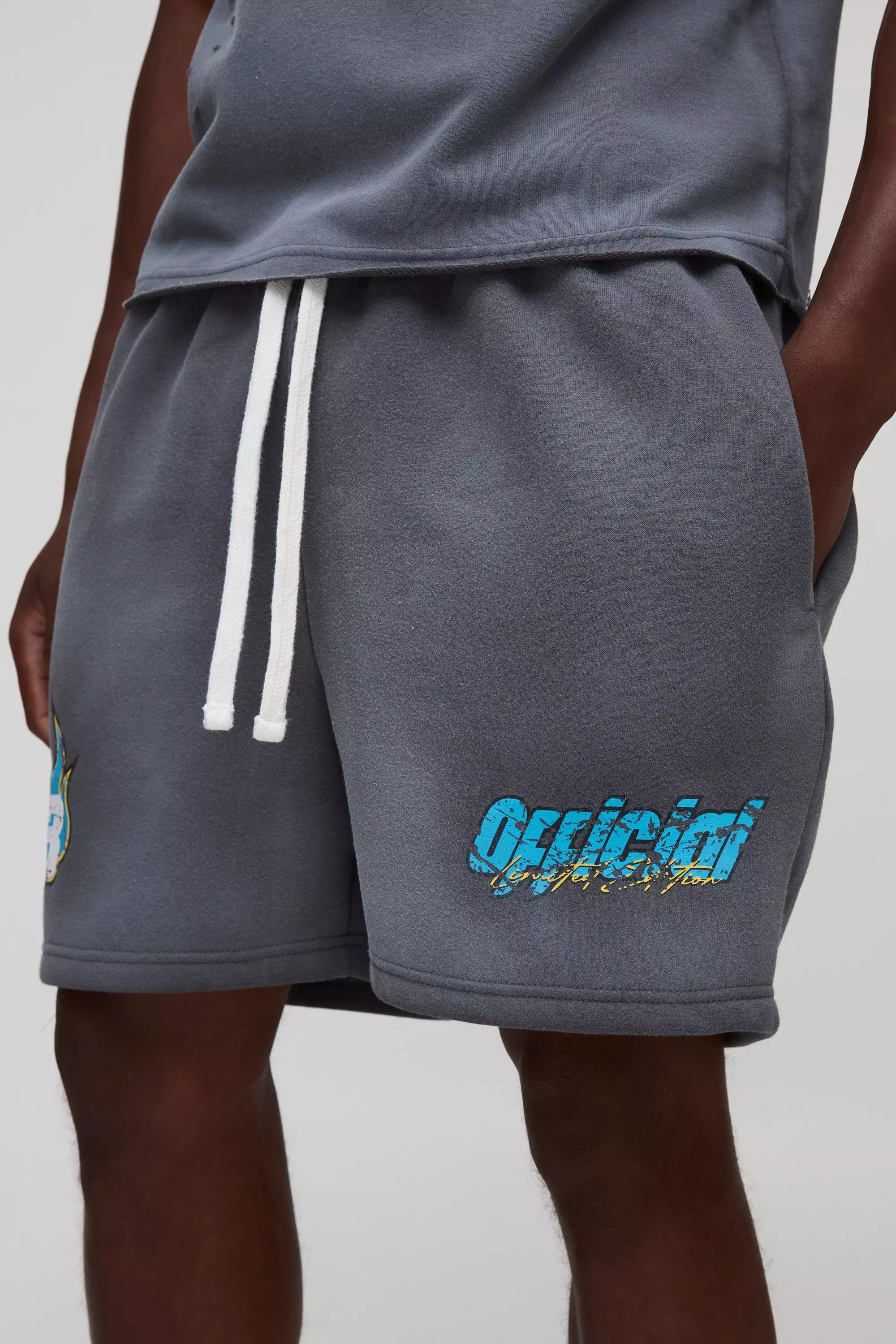 Relaxed Moto Graphic Washed Shorts | boohooMAN USA
