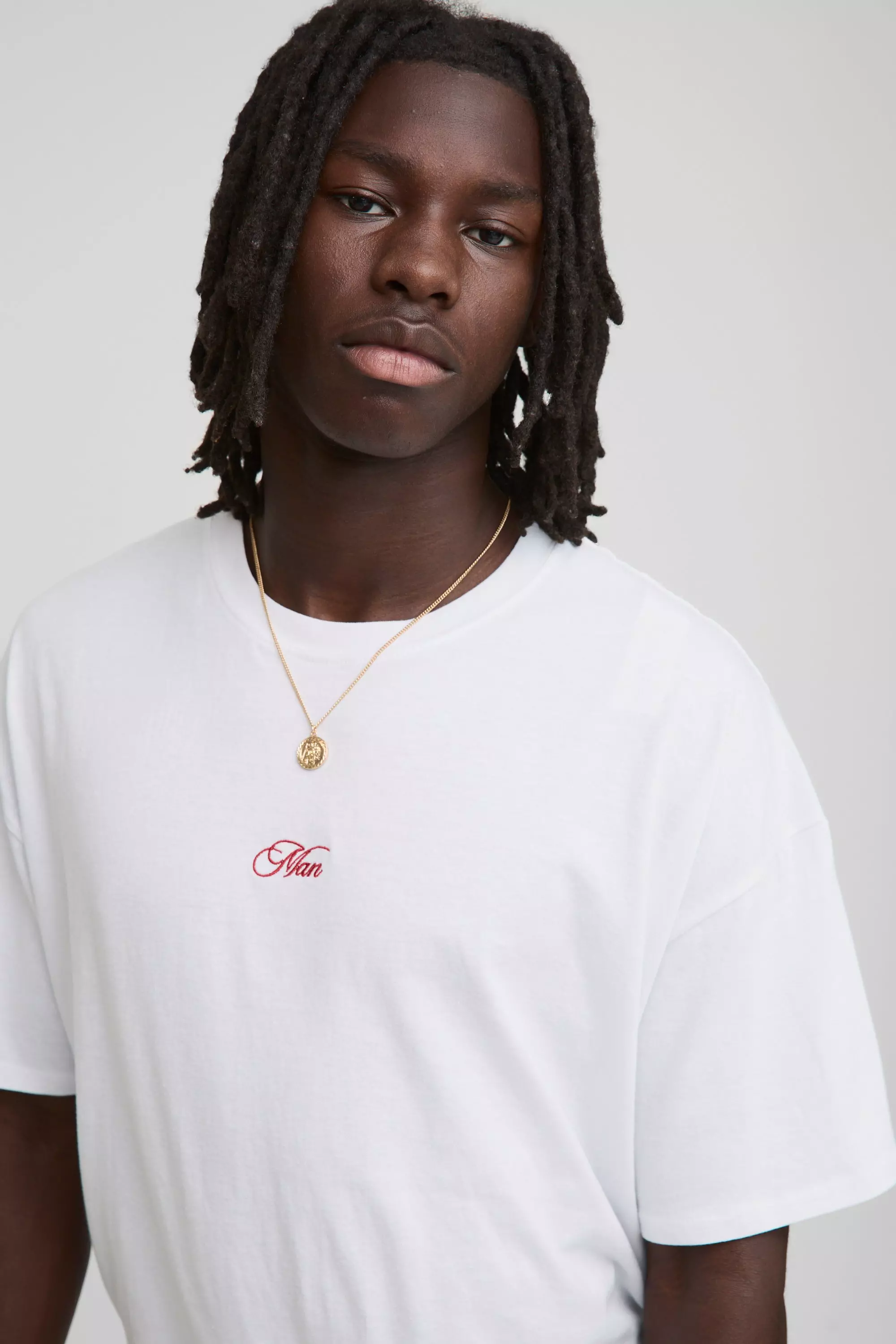 Weißes Oversize T-Shirt mit Man-Stickerei, White alternatives Bild