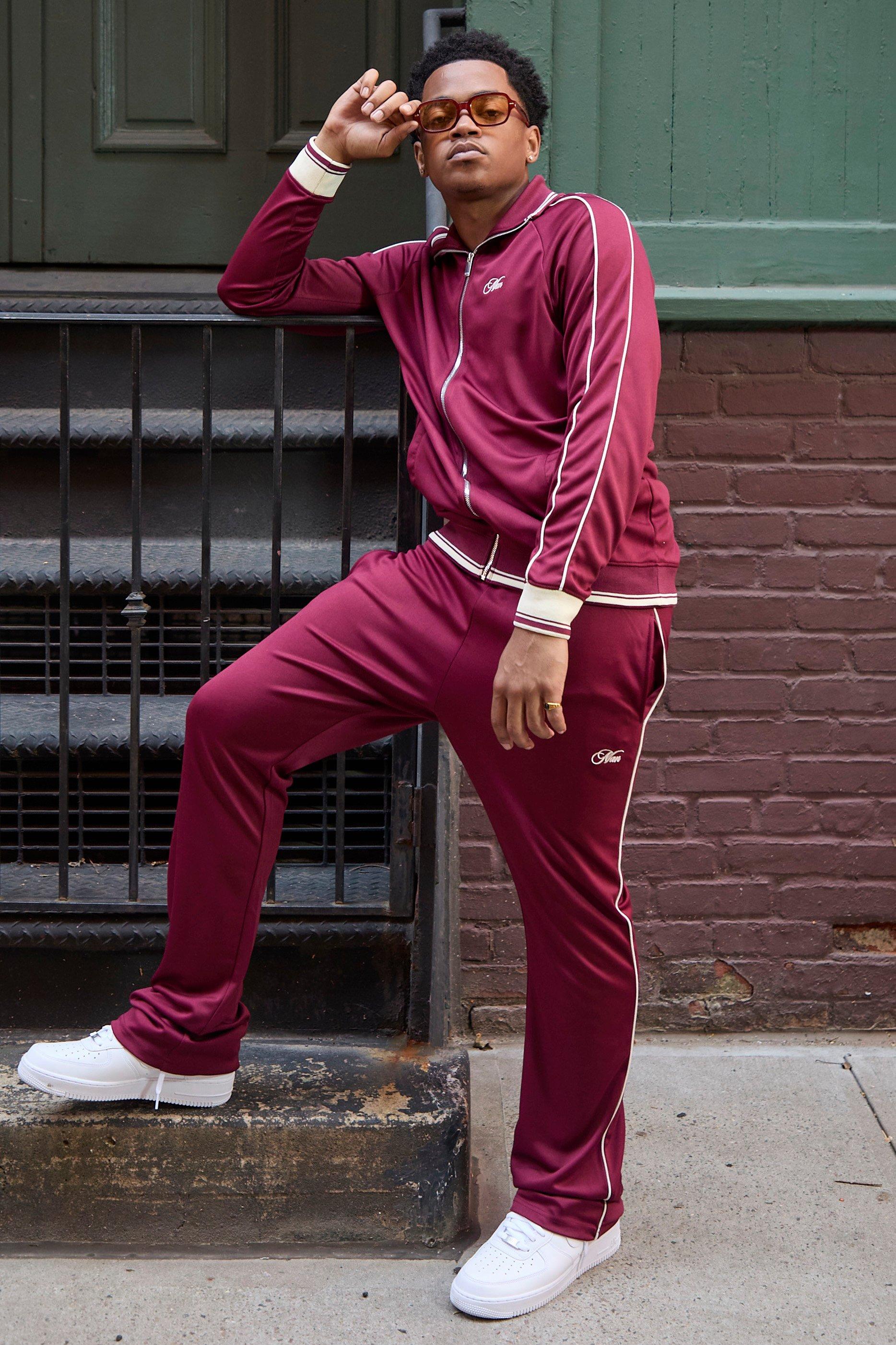 Slim Stacked Flare Embroidered Stripe Tricot Track Pants | boohooMAN USA