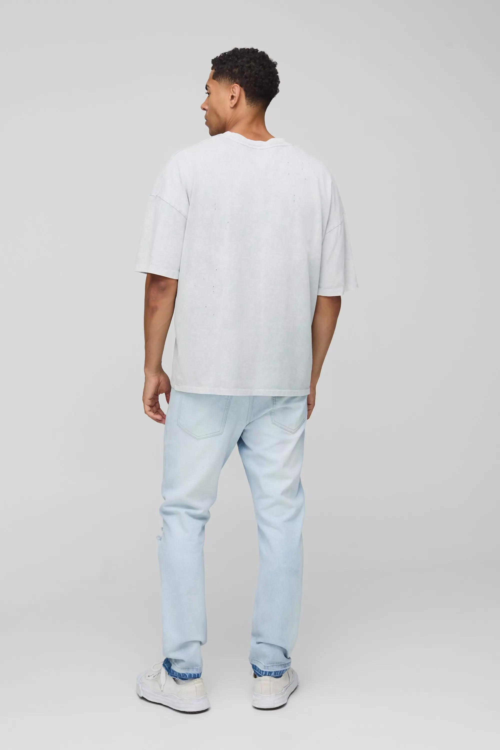 Slim Fit Subtle Ripped Tinted Jeans With Let Down Hem | boohooMAN USA