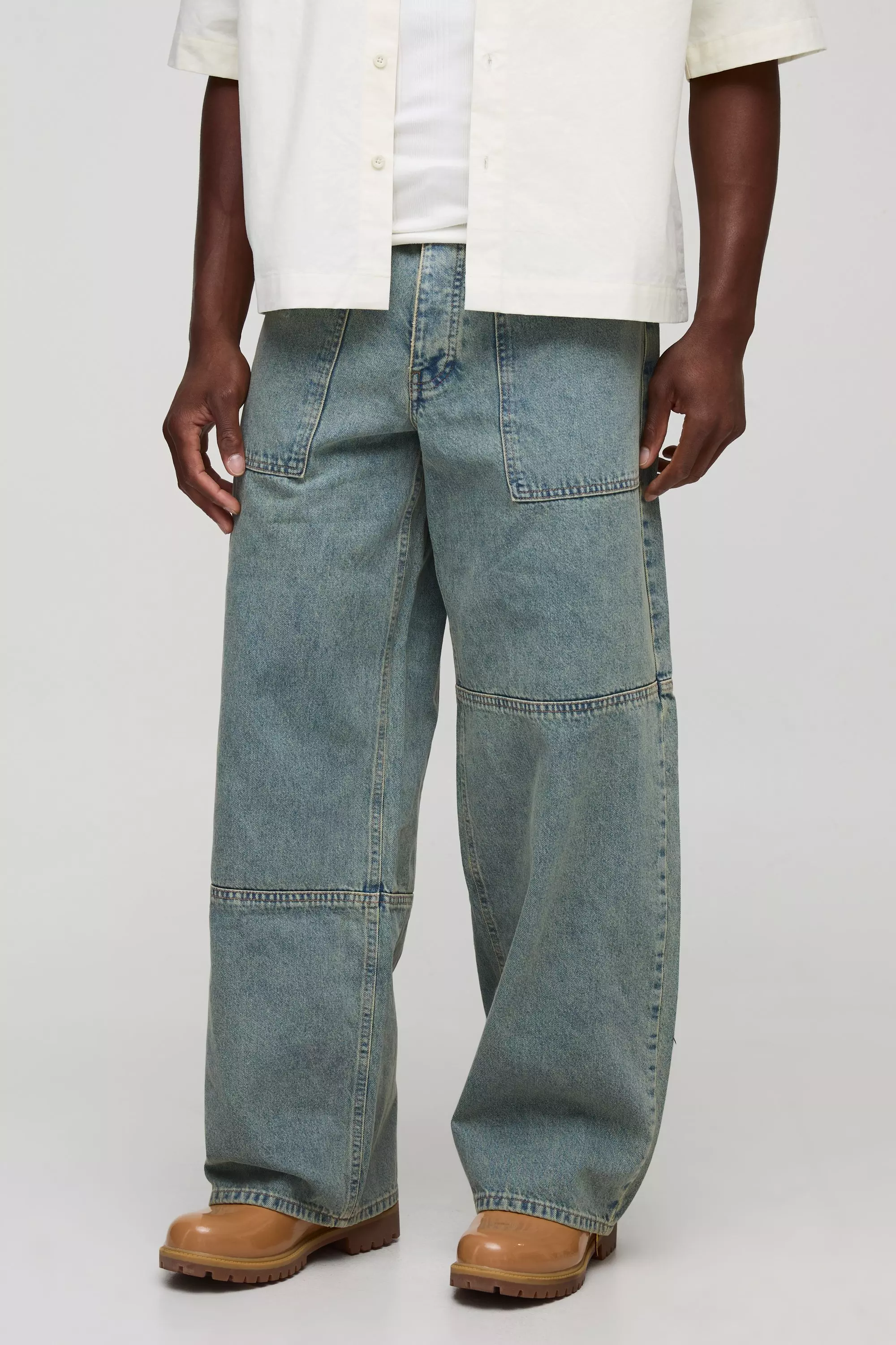 Baggy Fit Debossed Vintage Wash Jeans | boohooMAN USA