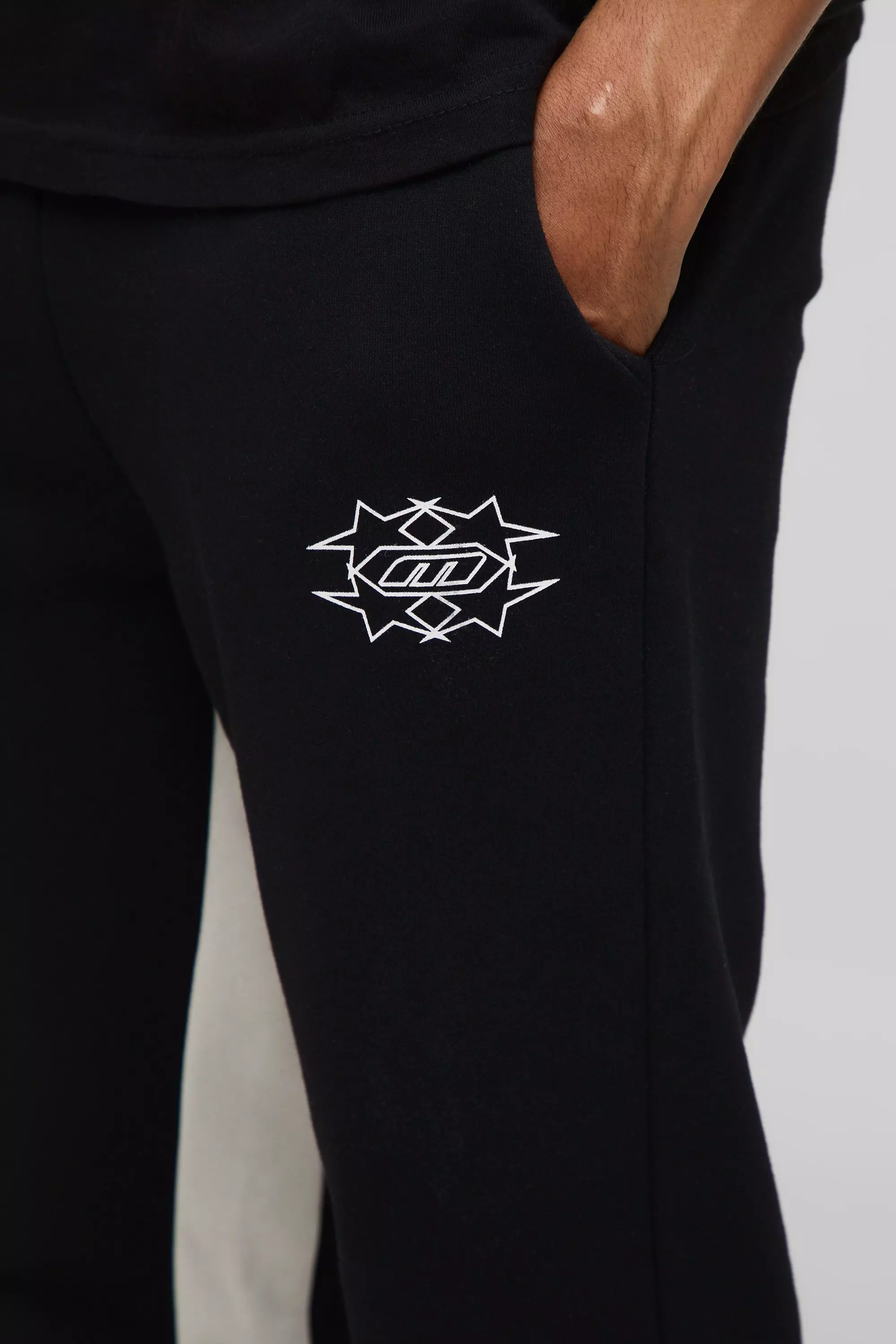Slim Stacked M Star Flare Gusset Joggers | boohooMAN USA