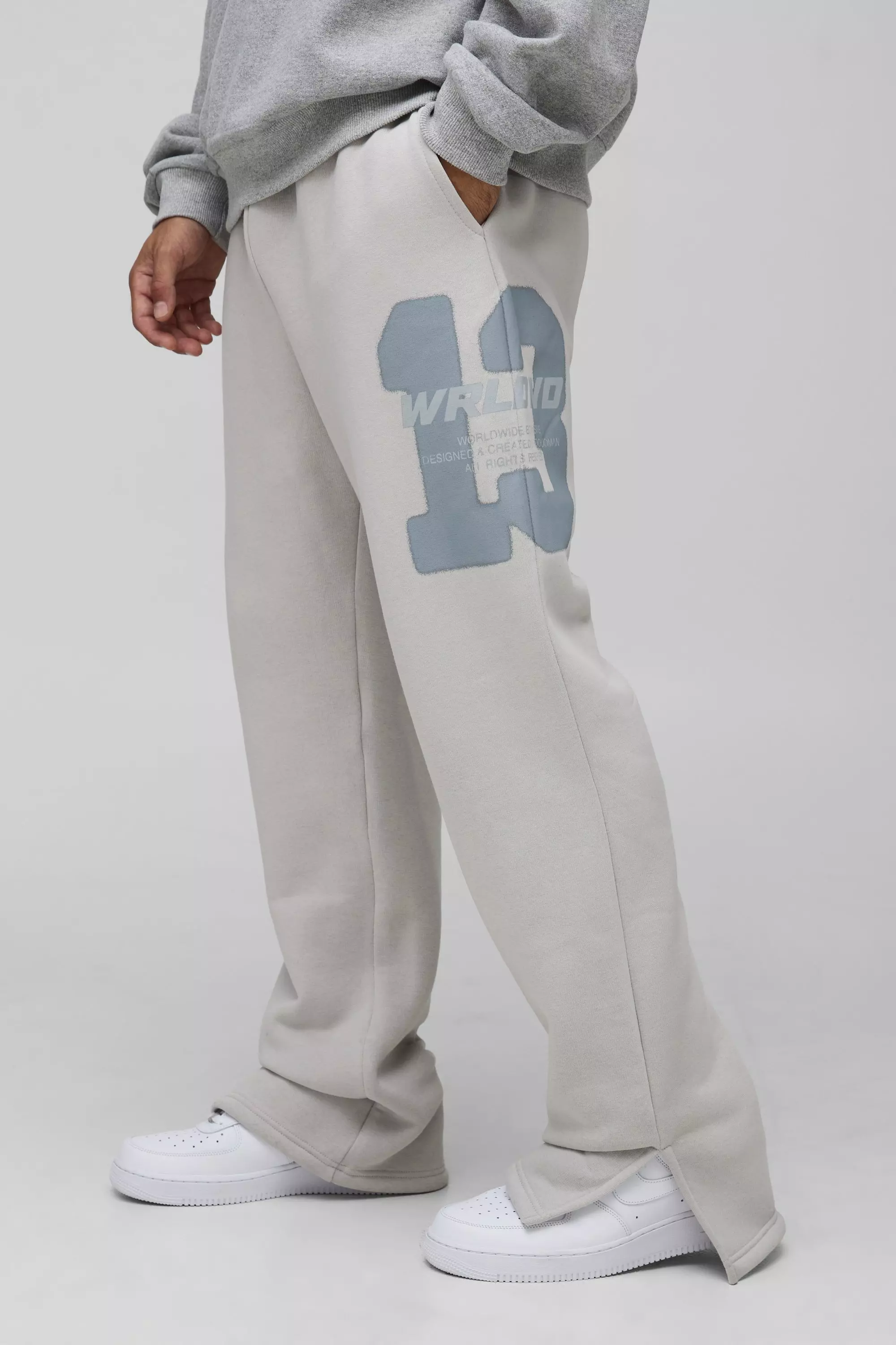 Relaxed Fit Worldwide 13 Varsity Split Hem Joggers | boohooMAN USA