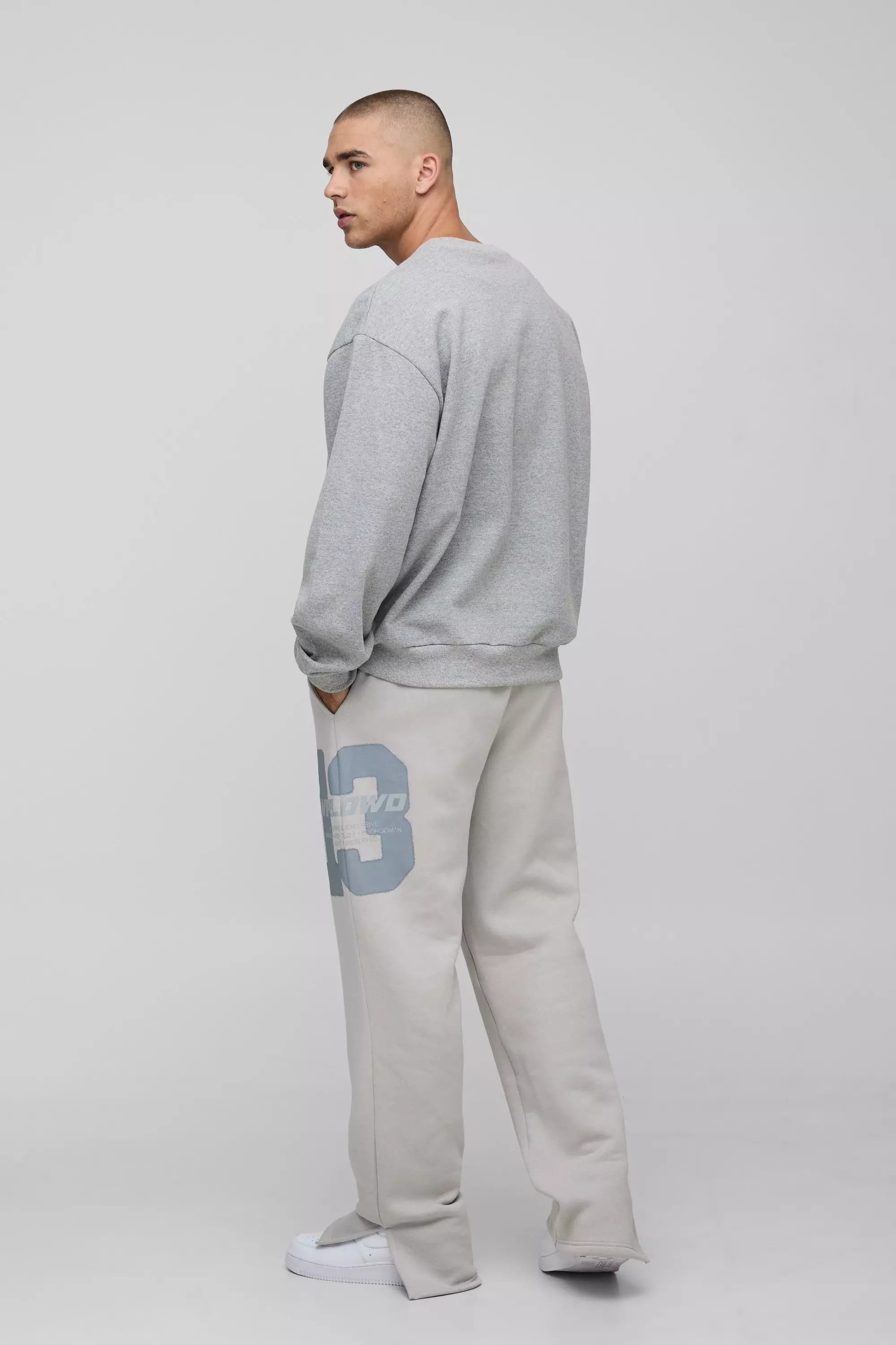 Relaxed Fit Worldwide 13 Varsity Split Hem Joggers | boohooMAN USA