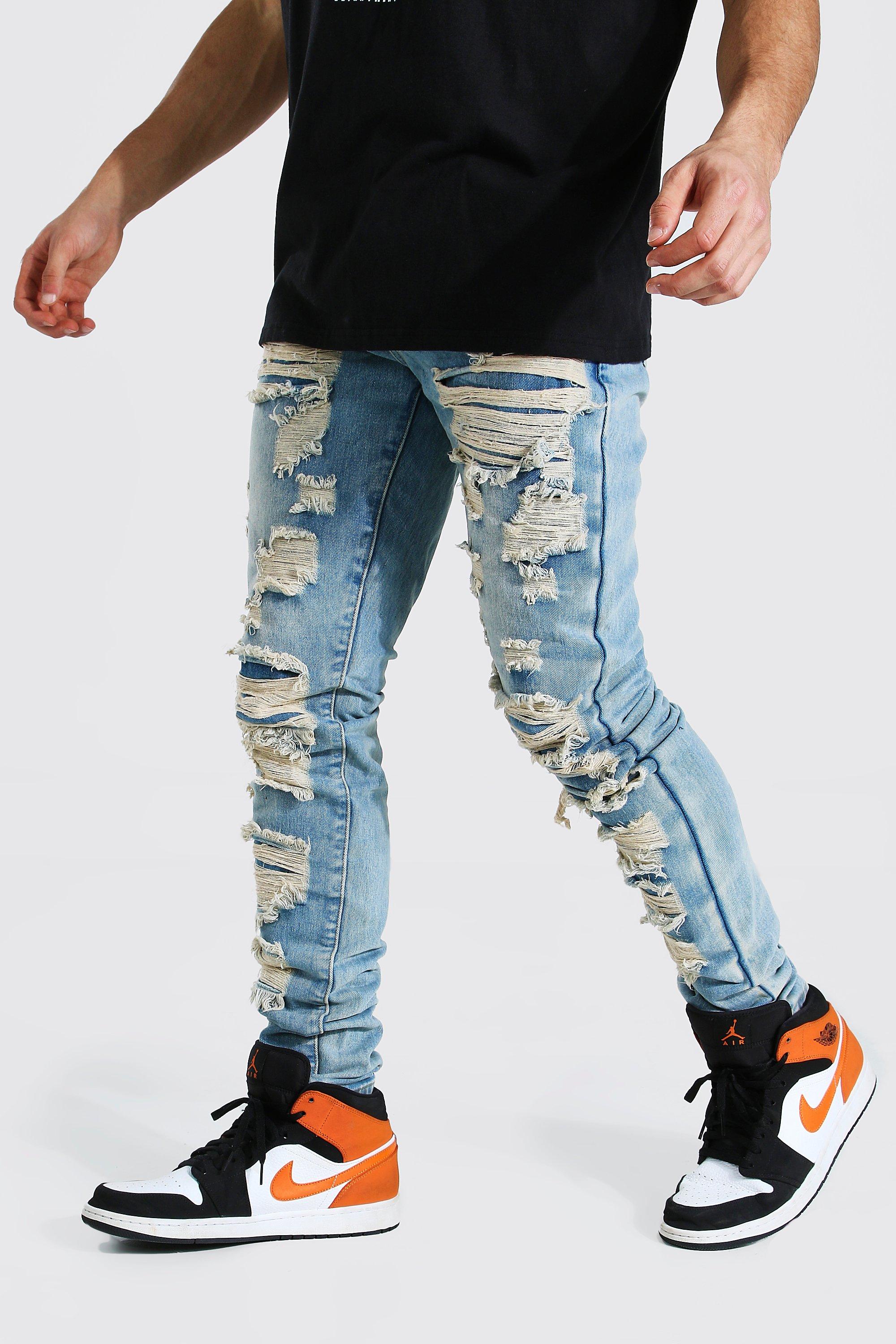 Tapered Stacked Leg Shredded Jeans | boohooMAN USA