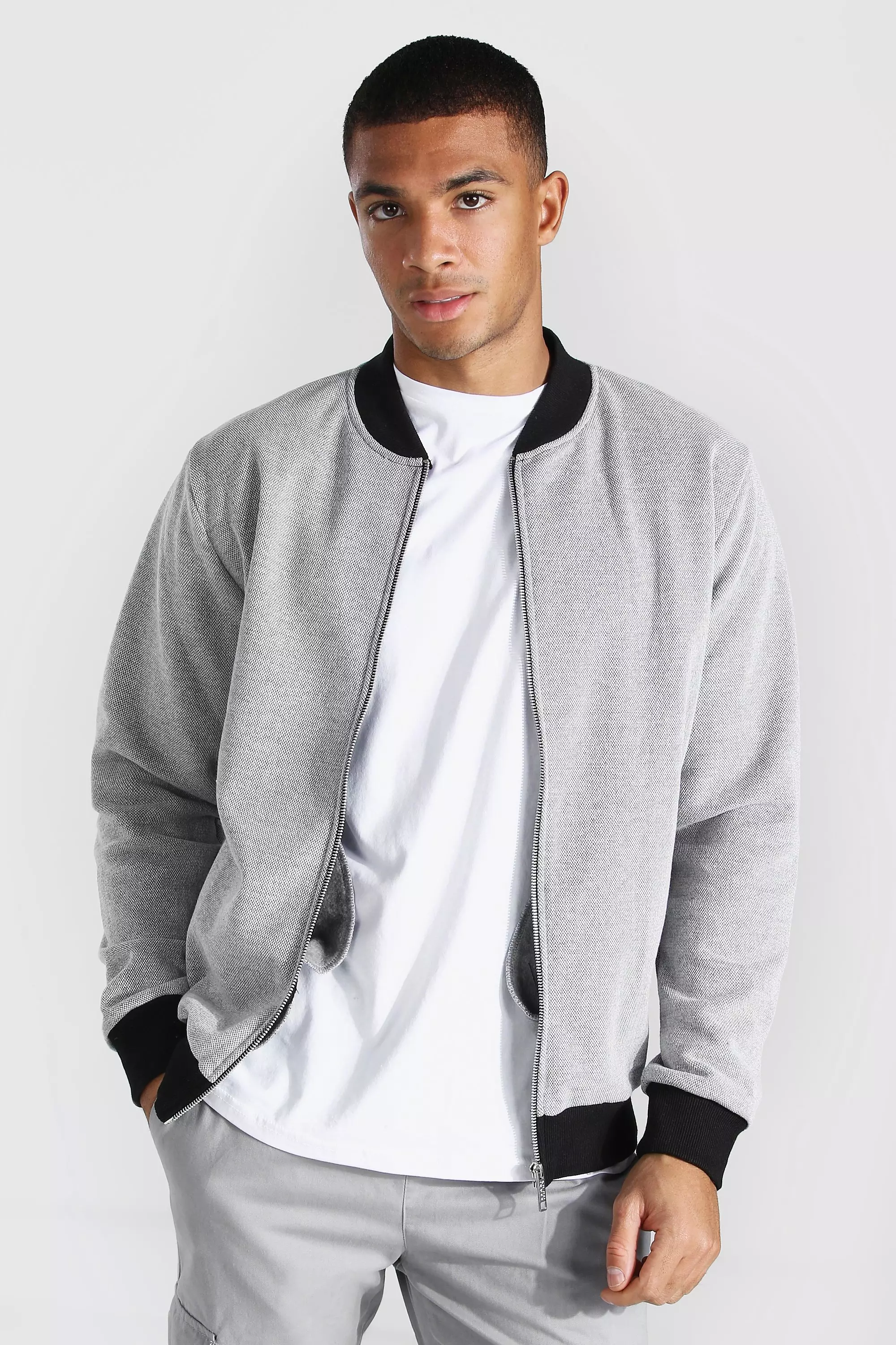 PU Badge Varsity Jacket In Grey | boohoo