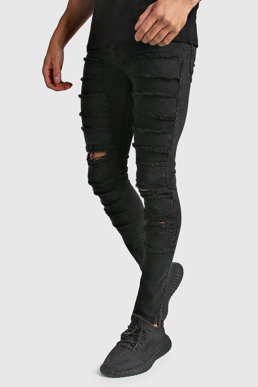 distressed patched jeans