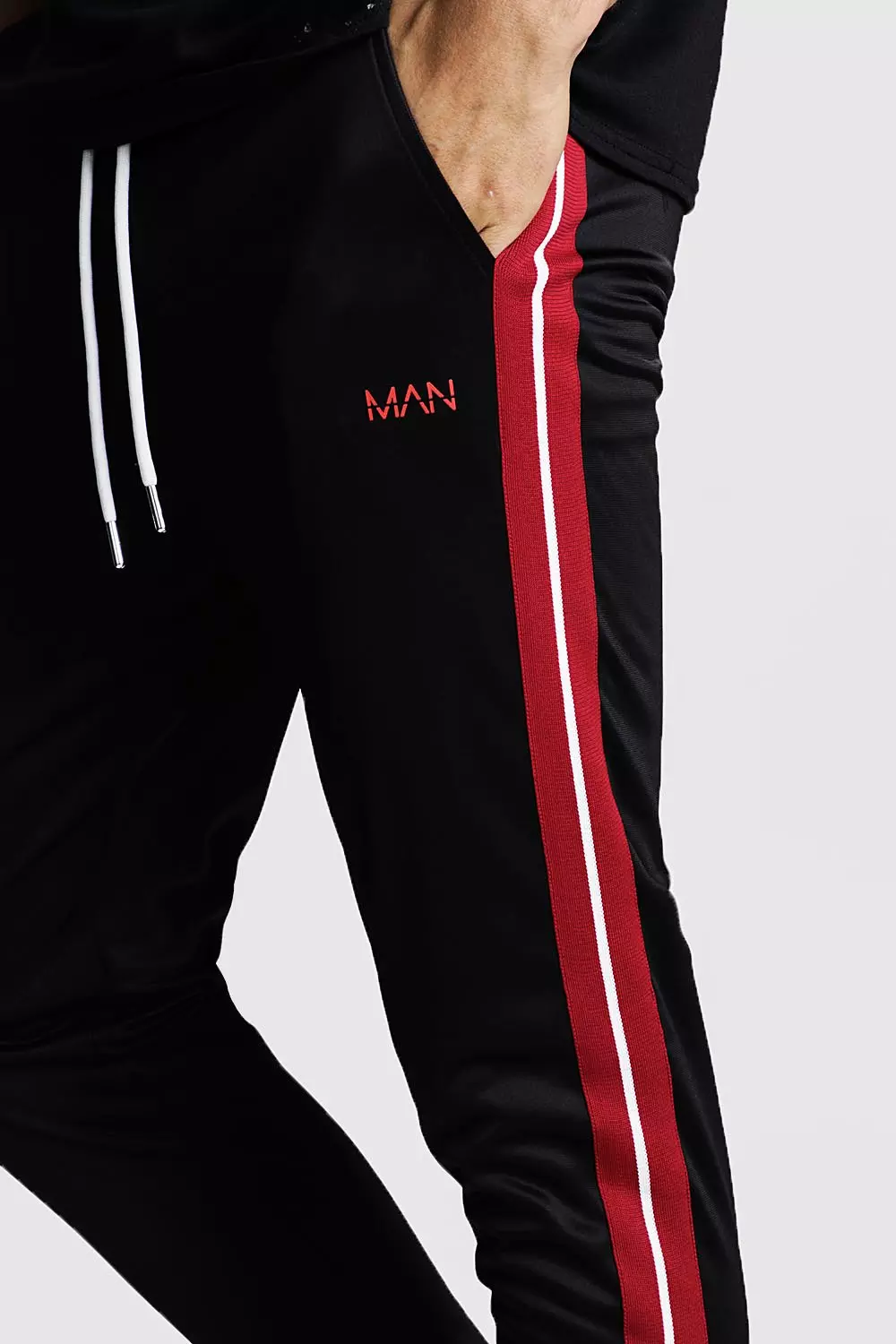 Black joggers with red stripe mens online