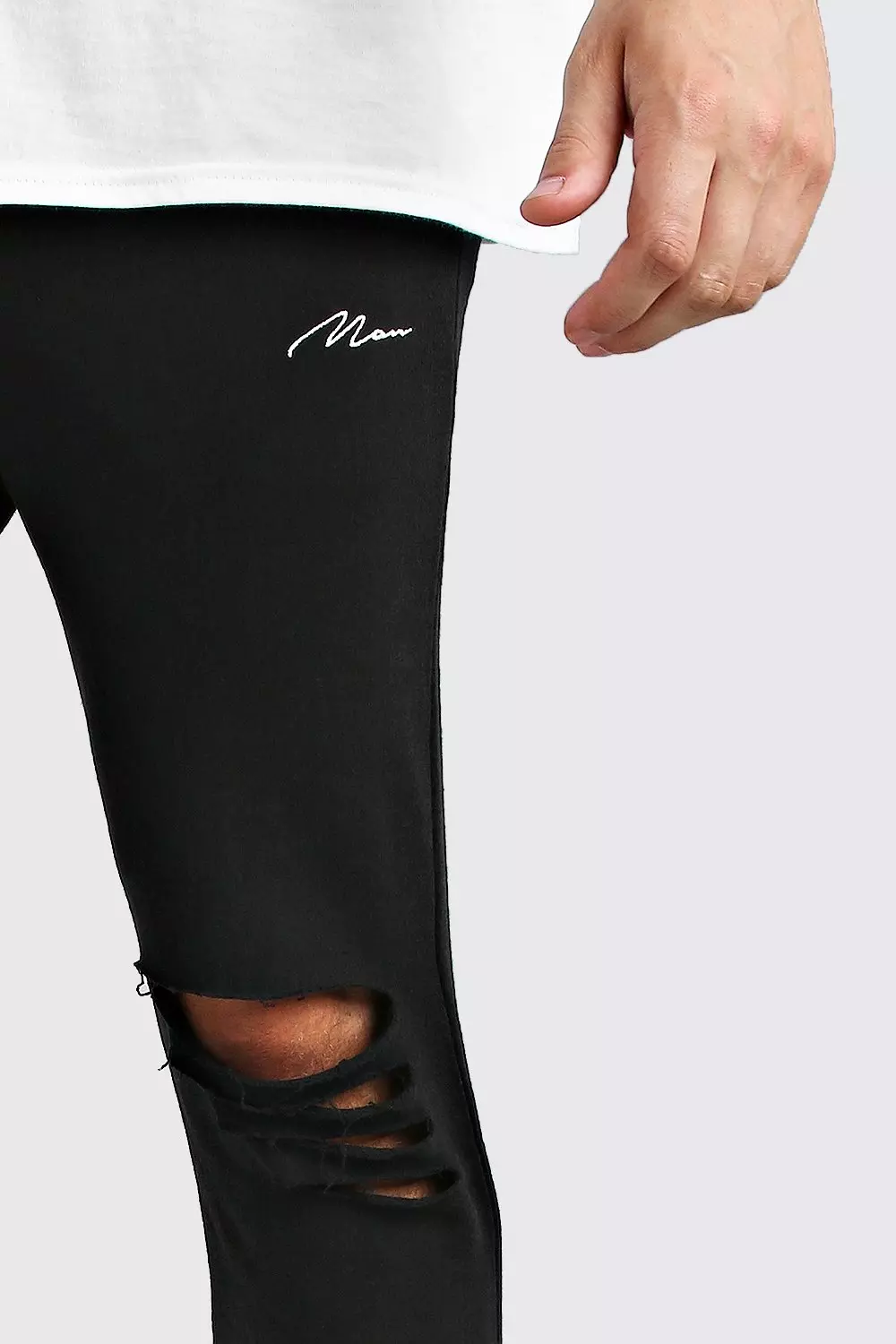 Ripped knee joggers mens online