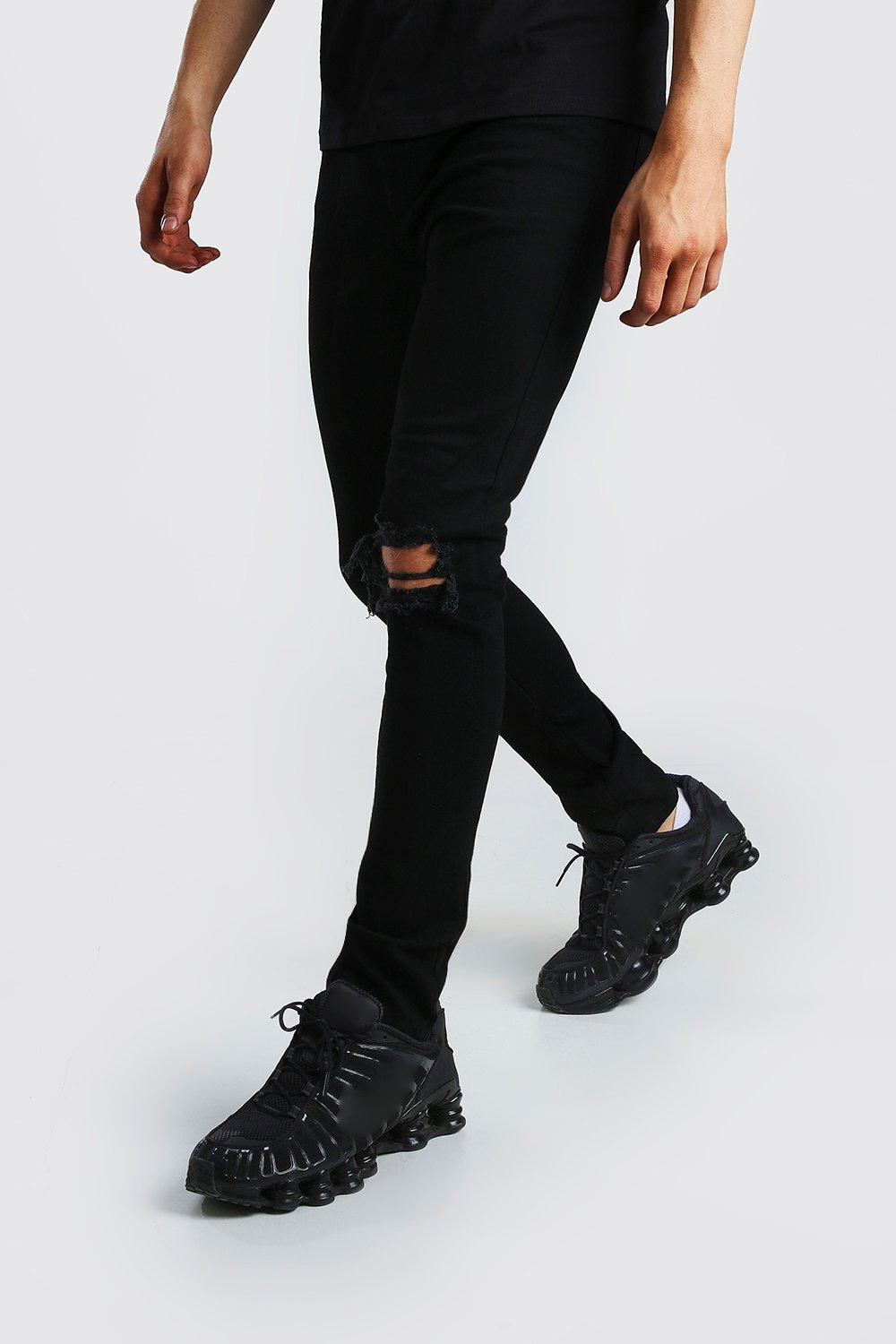 black busted knee skinny jeans