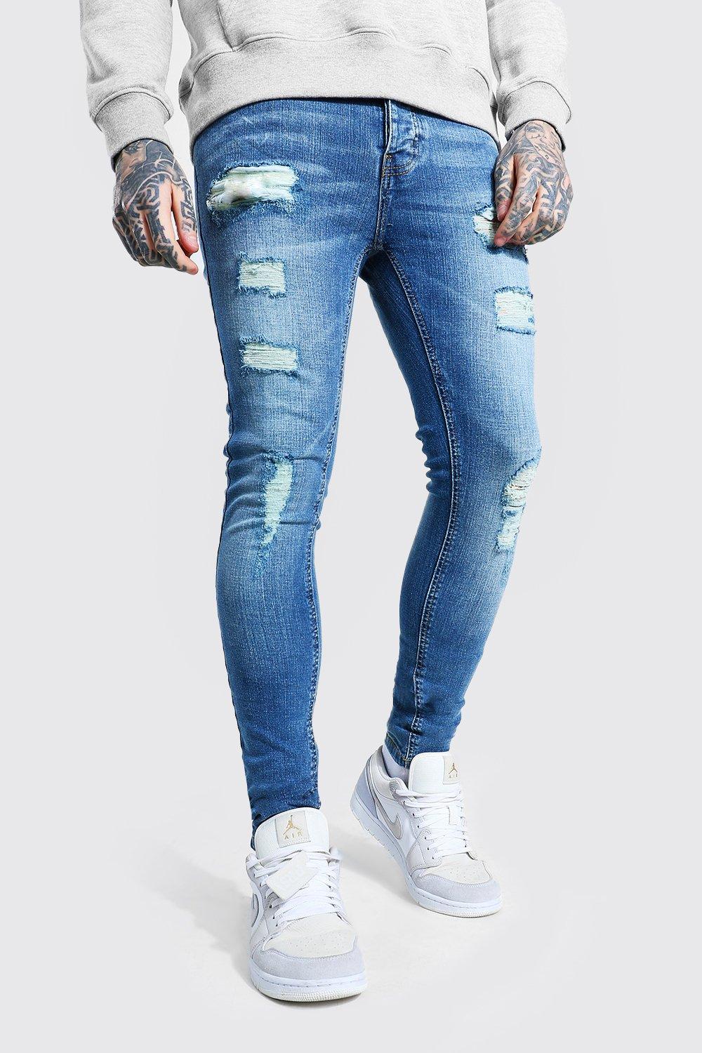 over ripped jeans