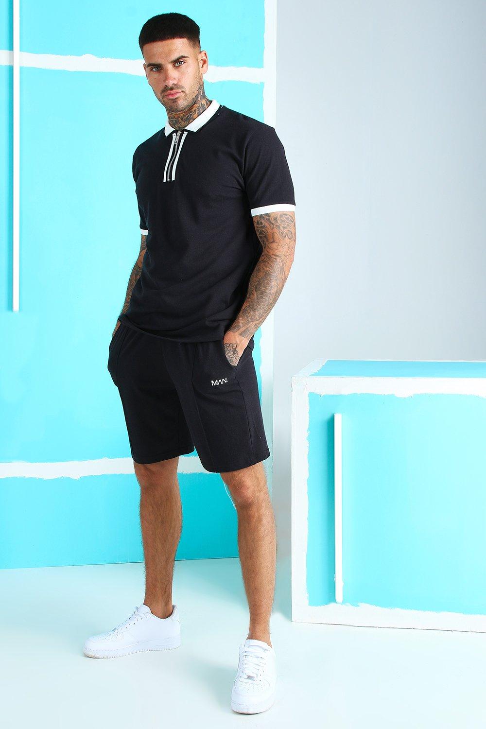 black polo and shorts