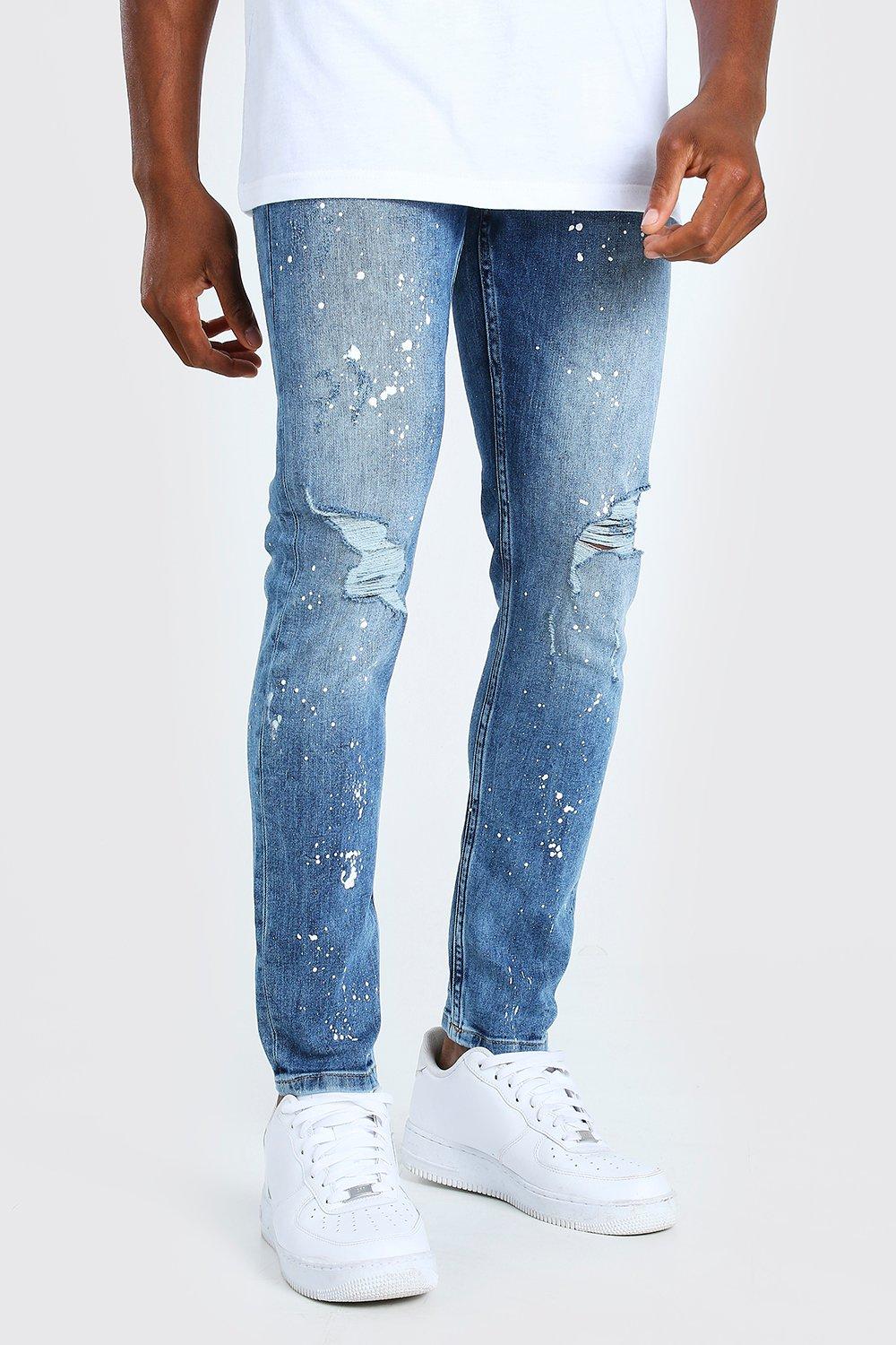 spray on skinny ripped jeans