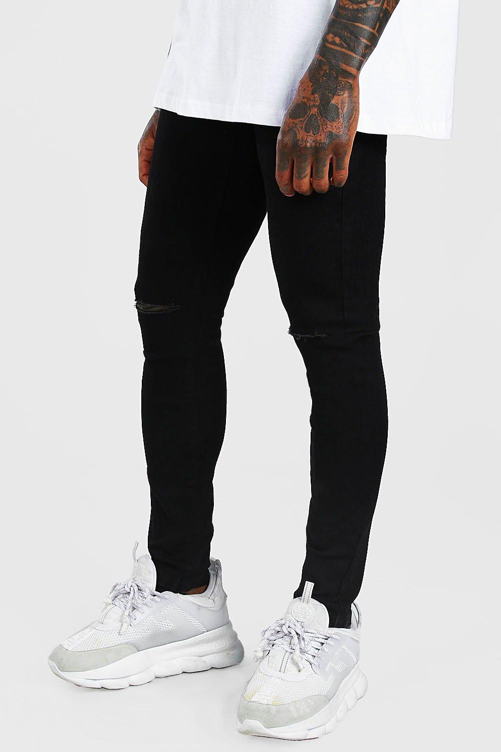 black skinny jeans with slits in knees
