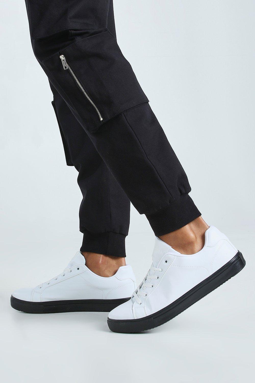 black with white sole trainers