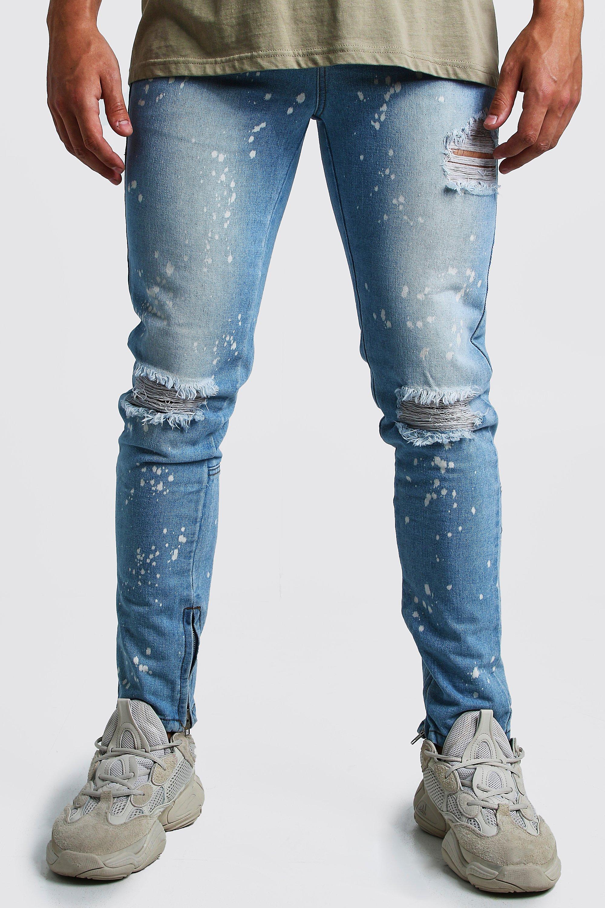 blue ripped knee jeans