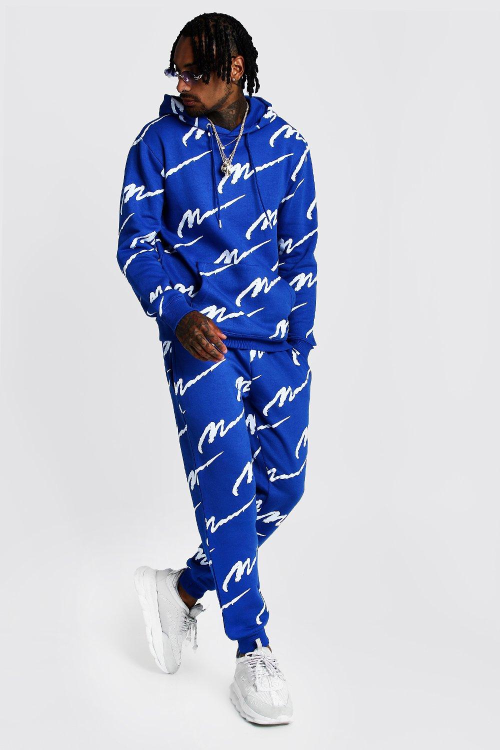 Boohooman all over store man printed tracksuit