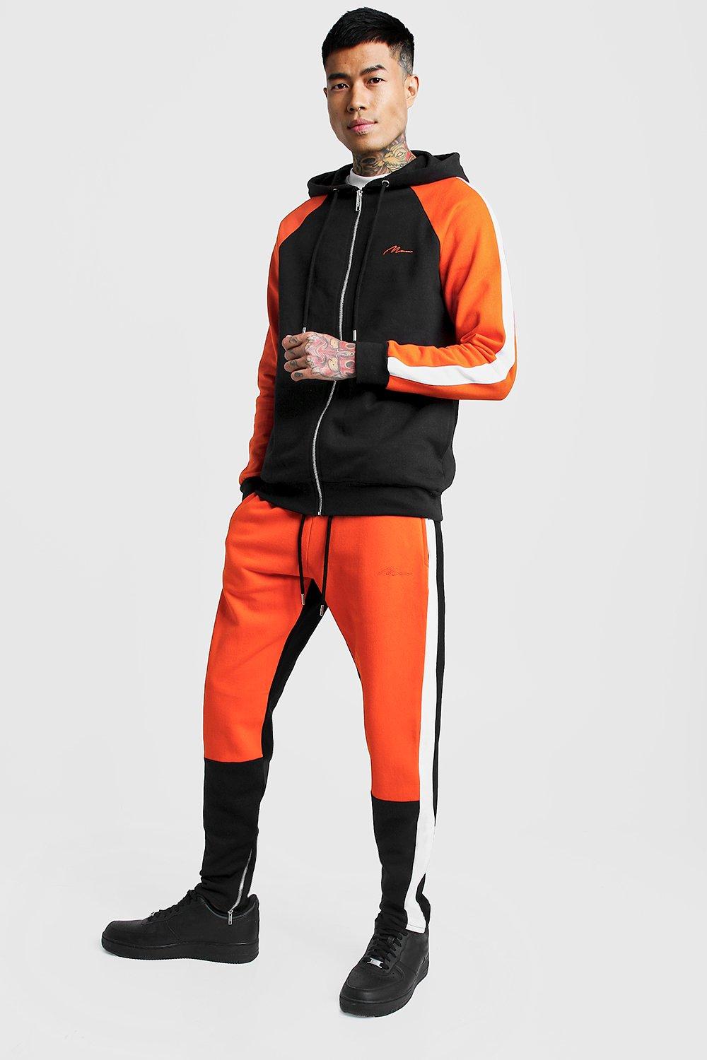 orange colour tracksuit