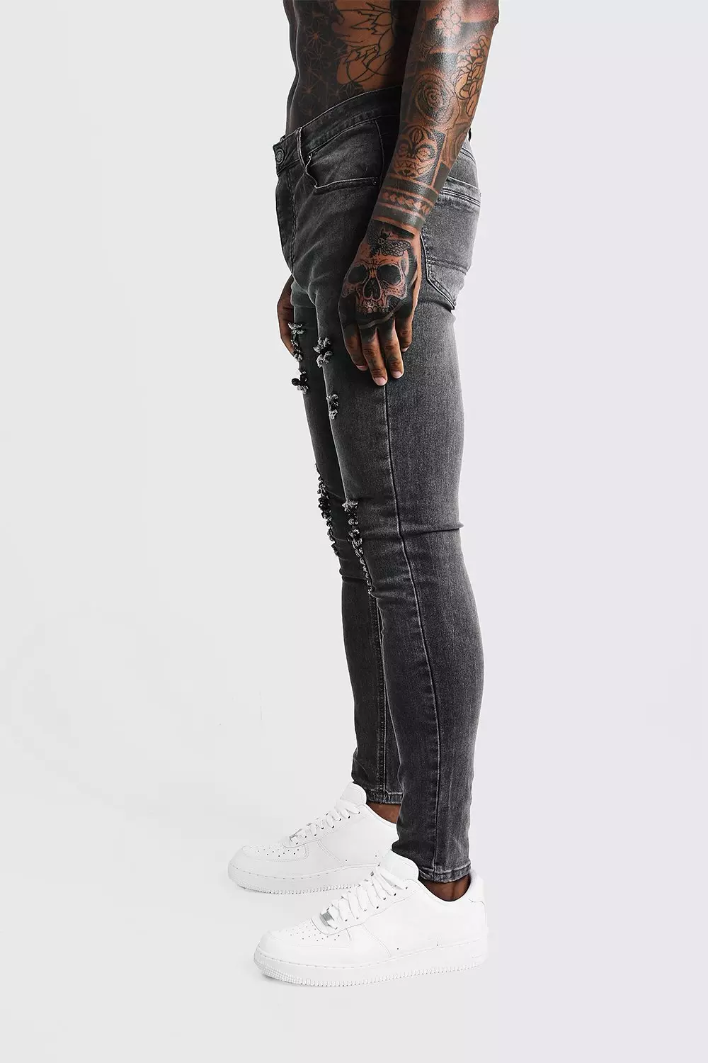 Super Skinny Jeans With All Over Rips | boohooMAN USA