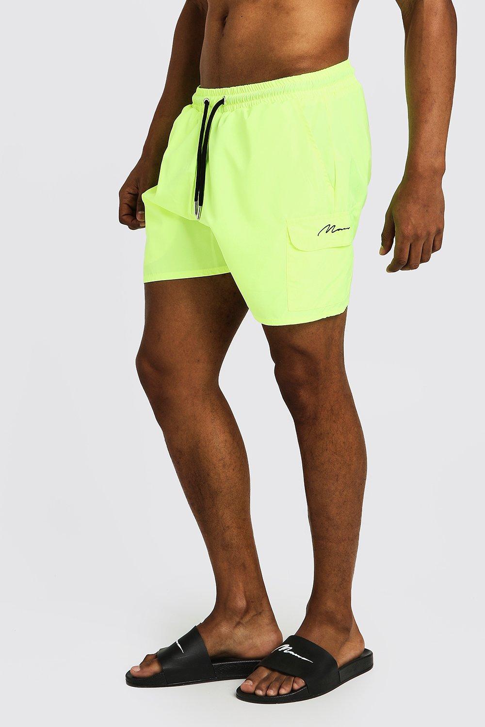 neon yellow swim trunks